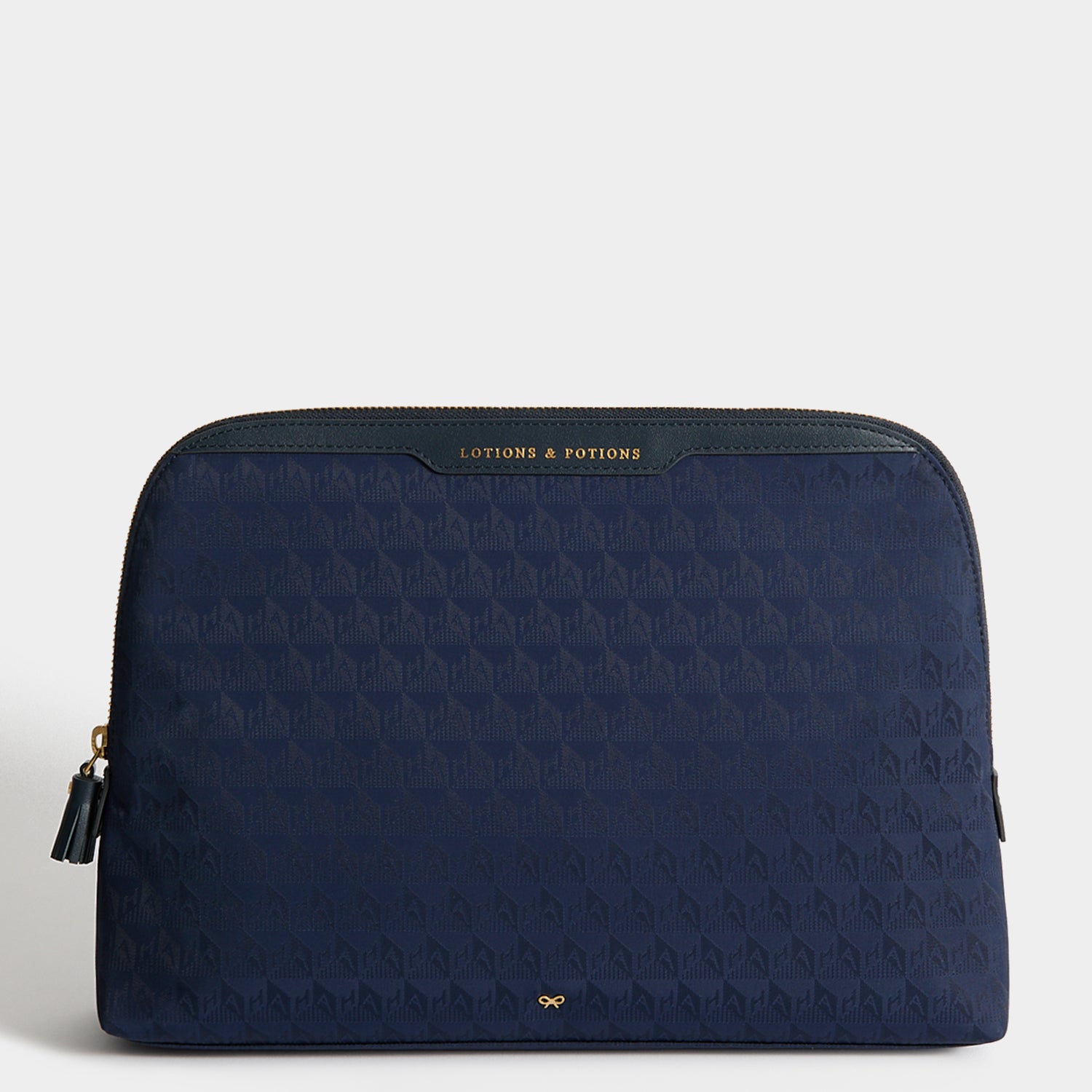 Logo Lotions and Potions Pouch -

          
            Jacquard Nylon in New Marine -
          

          Anya Hindmarch UK
