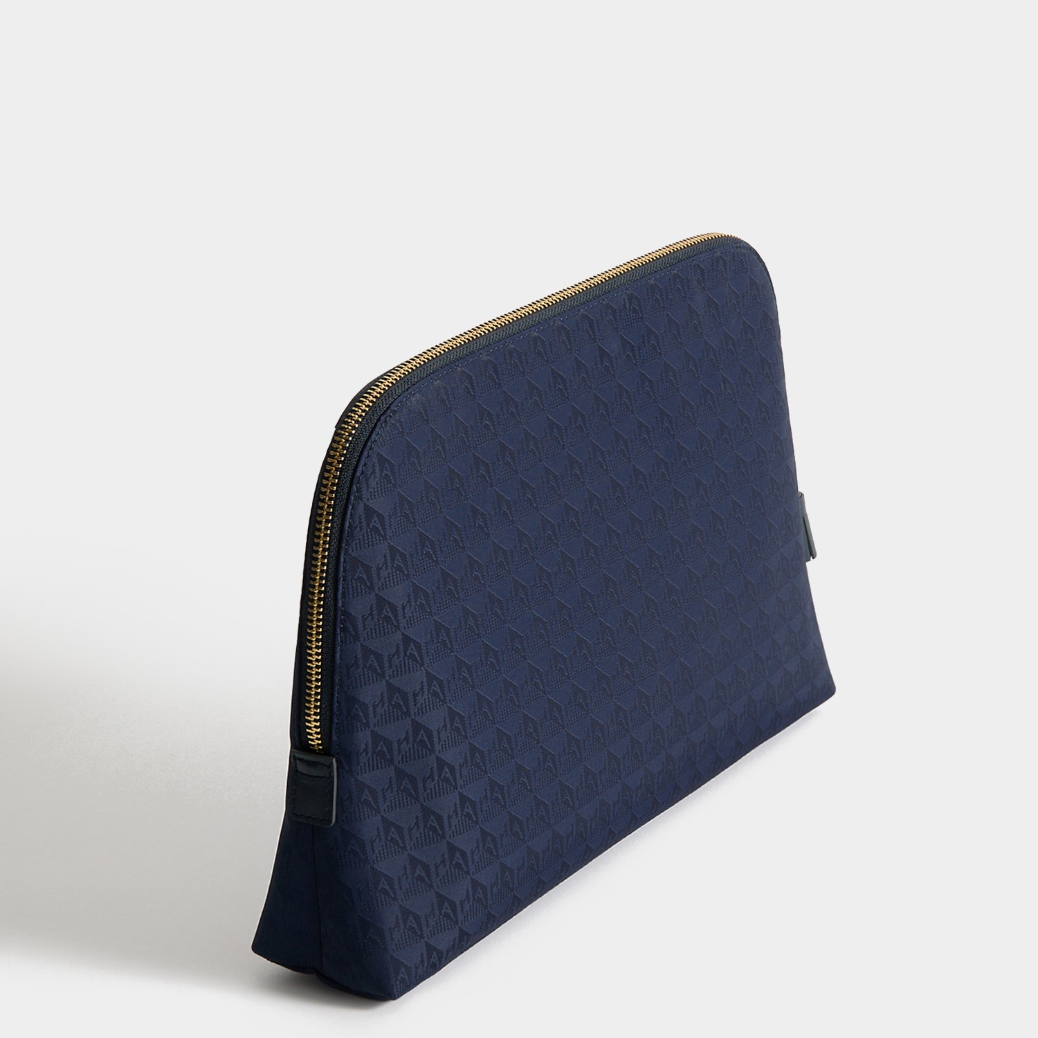 Logo Lotions and Potions Pouch -

          
            Jacquard Nylon in New Marine -
          

          Anya Hindmarch UK
