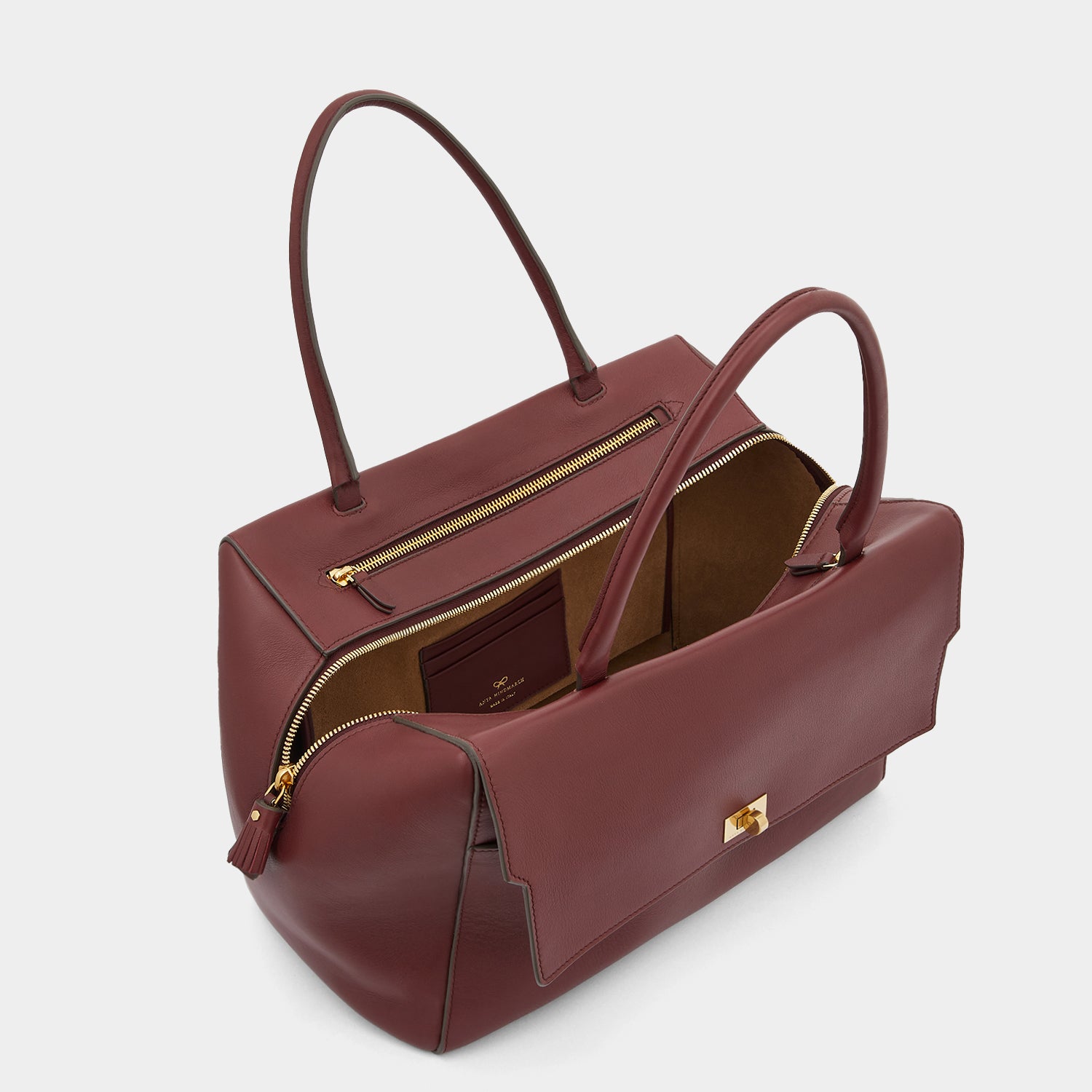 Seaton -

                  
                    Calf Leather in Rosewood -
                  

                  Anya Hindmarch UK
