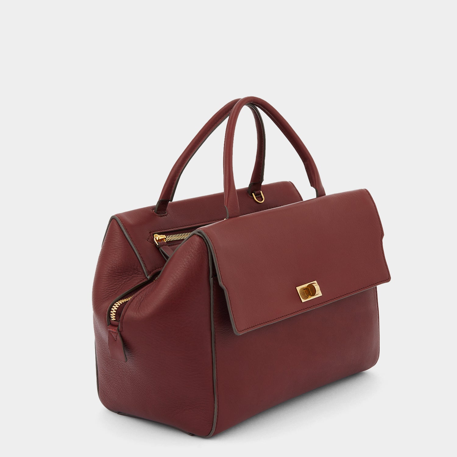 Seaton Cross-body -

                  
                    Calf Leather in Rosewood -
                  

                  Anya Hindmarch UK
