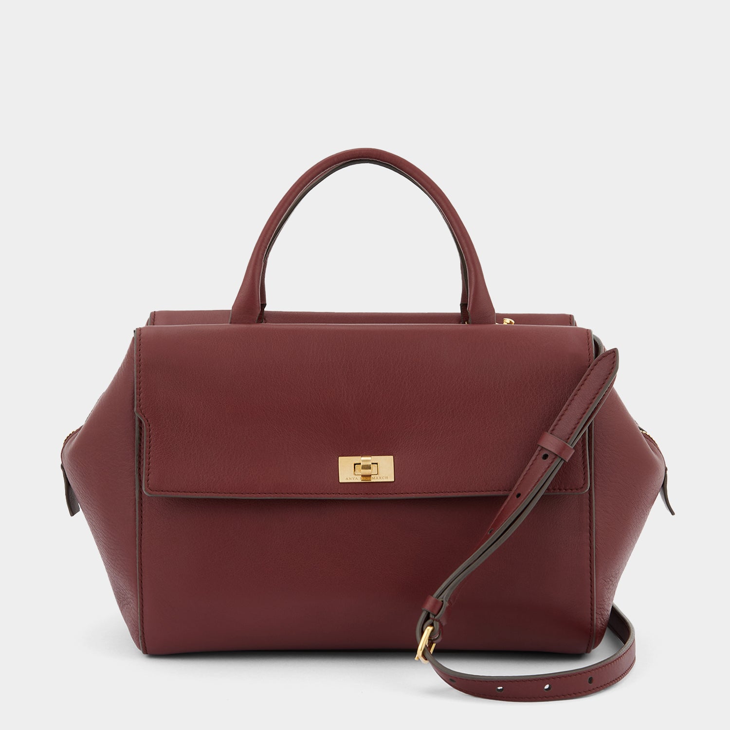 Seaton Cross-body -

                  
                    Calf Leather in Rosewood -
                  

                  Anya Hindmarch UK
