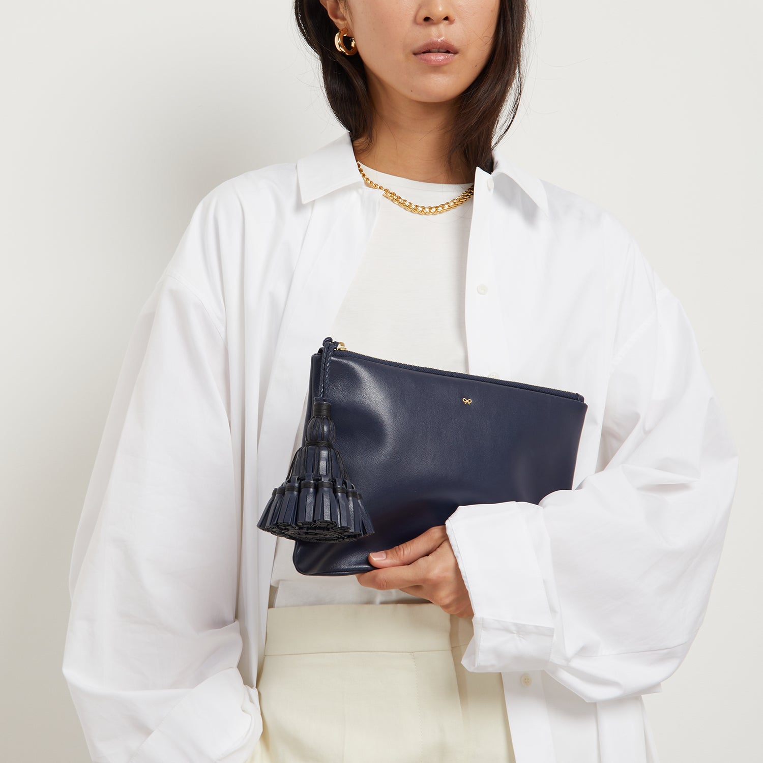 Georgiana Clutch -

                  
                    Circus Leather in Ink -
                  

                  Anya Hindmarch UK
