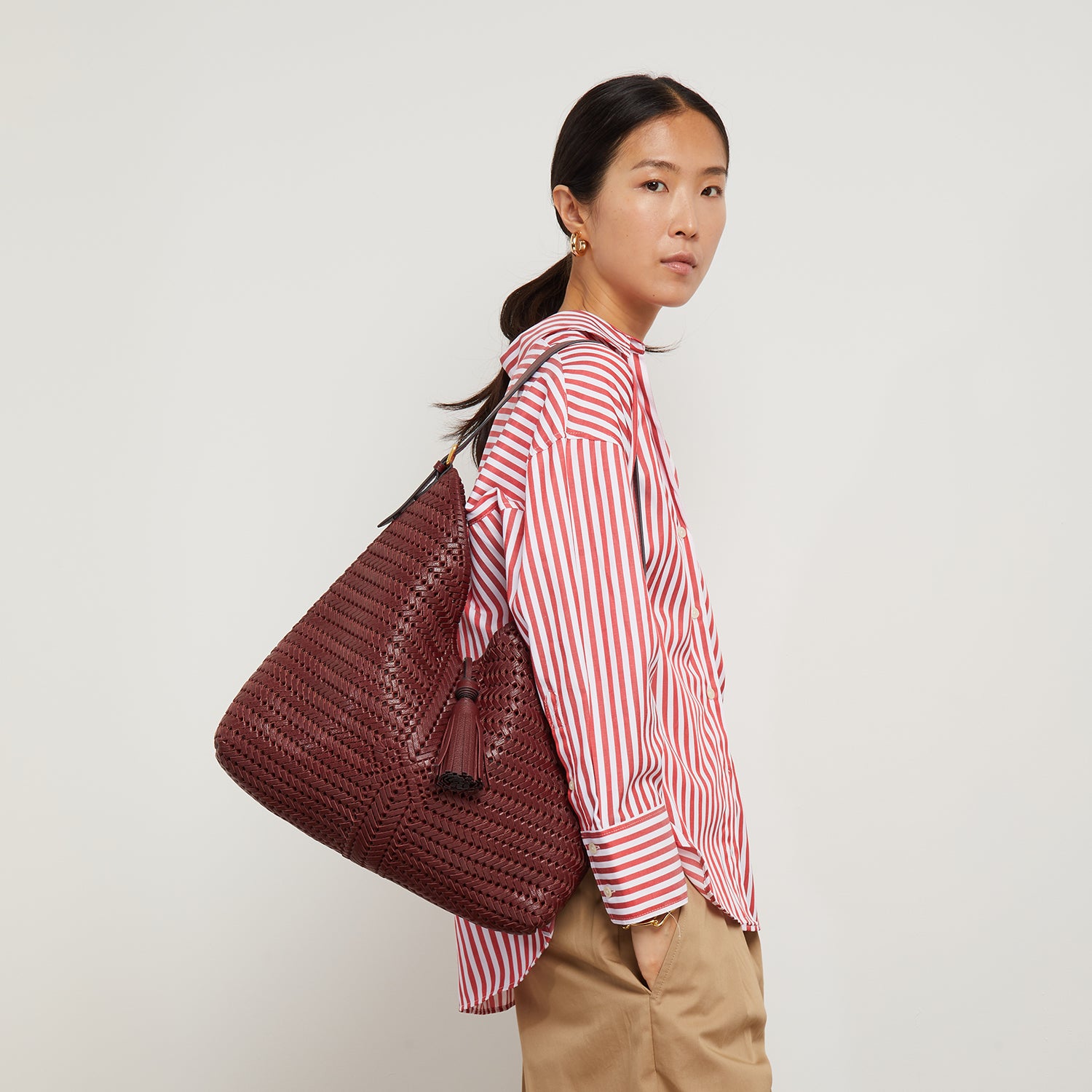 Neeson Tassel Hobo -

                  
                    Capra Leather in Rosewood -
                  

                  Anya Hindmarch UK
