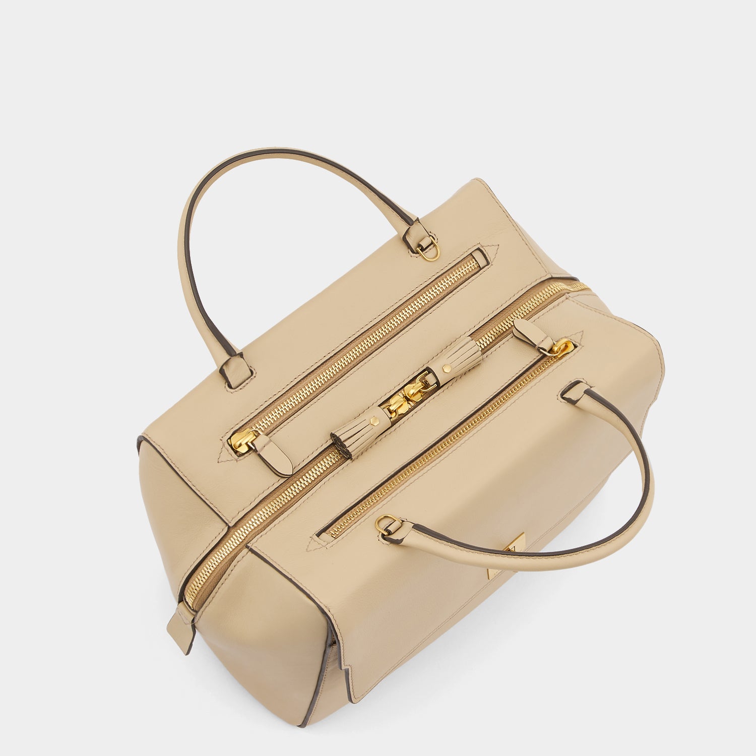 Small Seaton -

                  
                    Calf Leather in Buff -
                  

                  Anya Hindmarch UK
