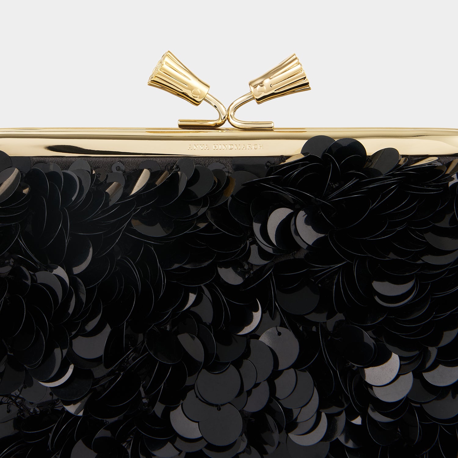 Maud Embellished Tassel Clutch -

                  
                    Sequins in Black -
                  

                  Anya Hindmarch UK
