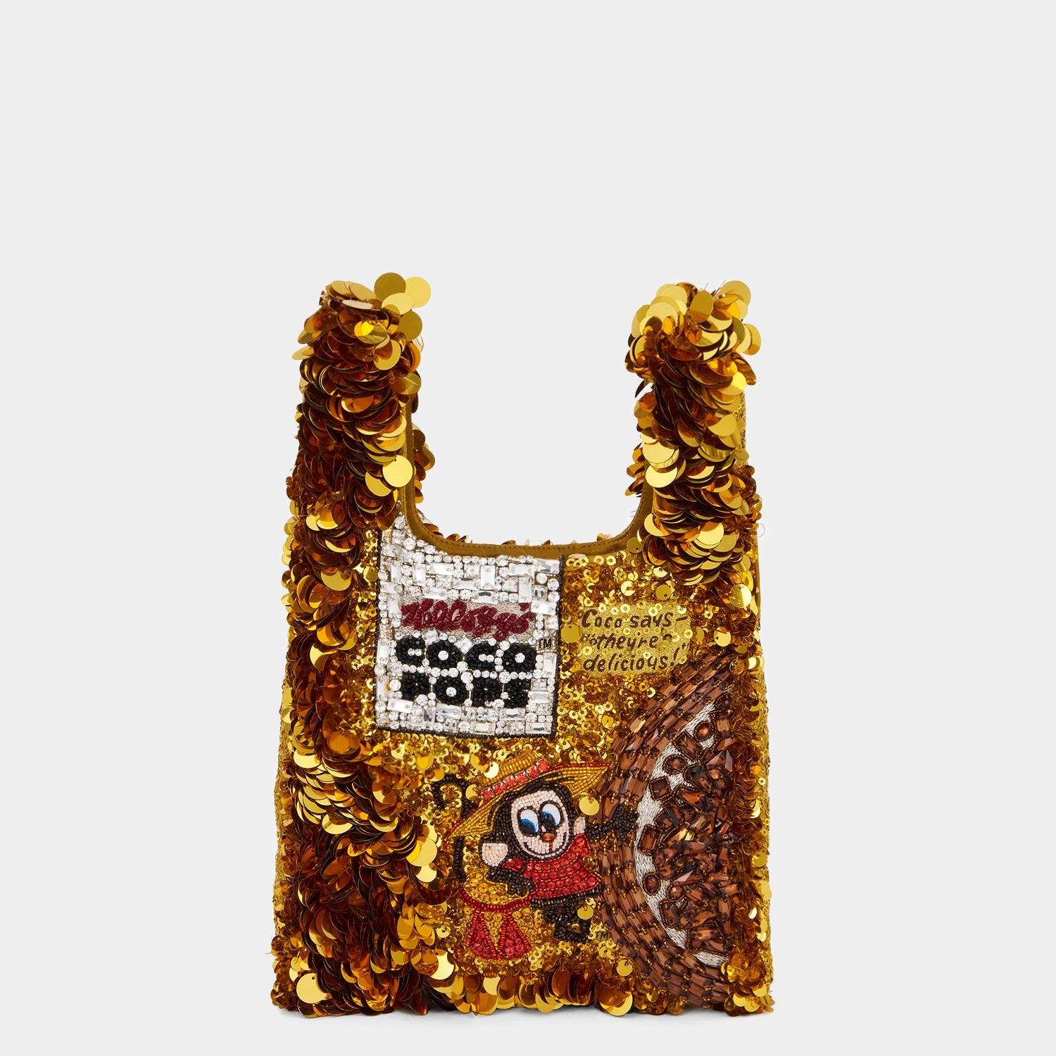 Anya Brands Coco Pops Mini Tote -

                  
                    Sequins in Old Gold -
                  

                  Anya Hindmarch UK
