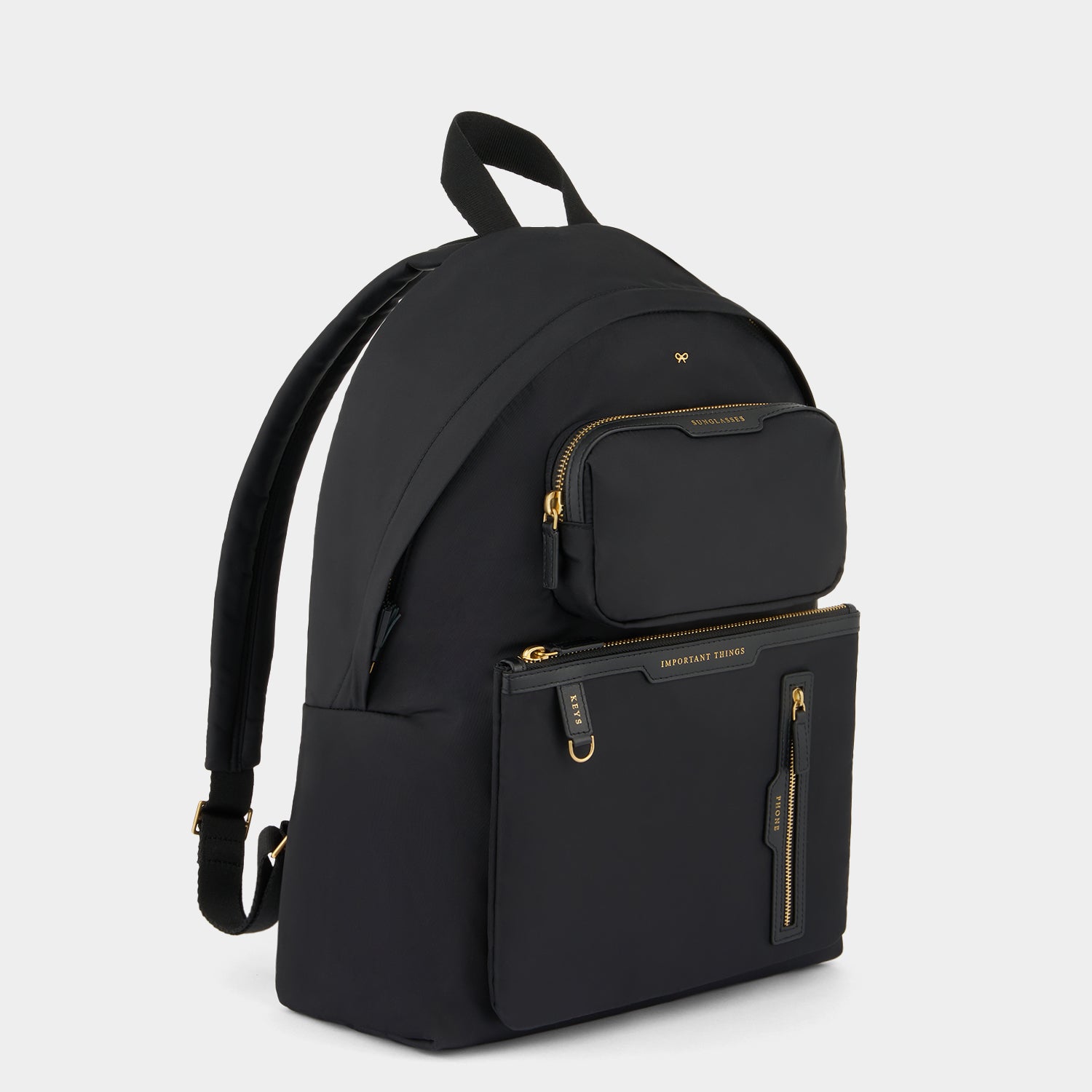 Multi Pocket Backpack -

          
            Regenerated ECONYL® in Black -
          

          Anya Hindmarch UK
