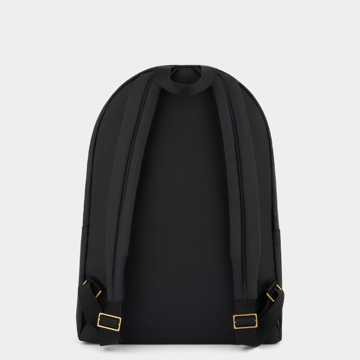 Multi Pocket Backpack -

                  
                    Regenerated ECONYL® in Black -
                  

                  Anya Hindmarch UK
