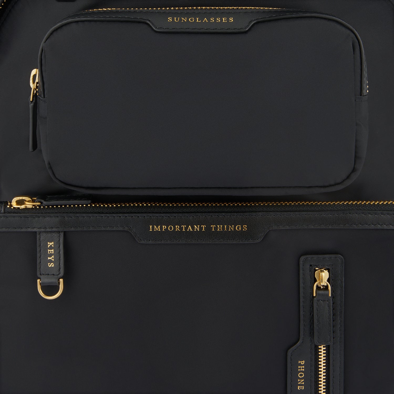 Multi Pocket Backpack -

                  
                    Regenerated ECONYL® in Black -
                  

                  Anya Hindmarch UK
