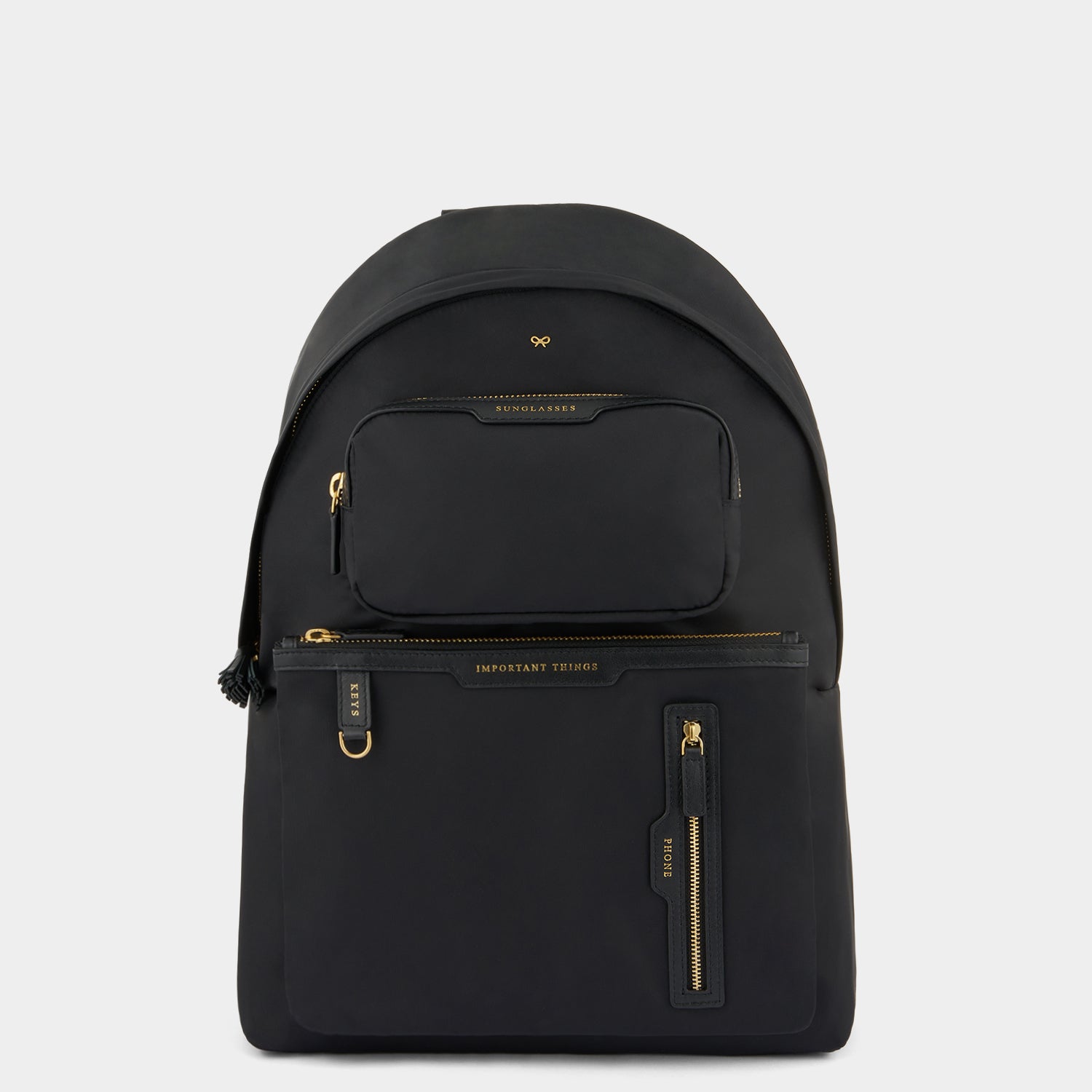 Multi Pocket Backpack -

                  
                    Regenerated ECONYL® in Black -
                  

                  Anya Hindmarch UK
