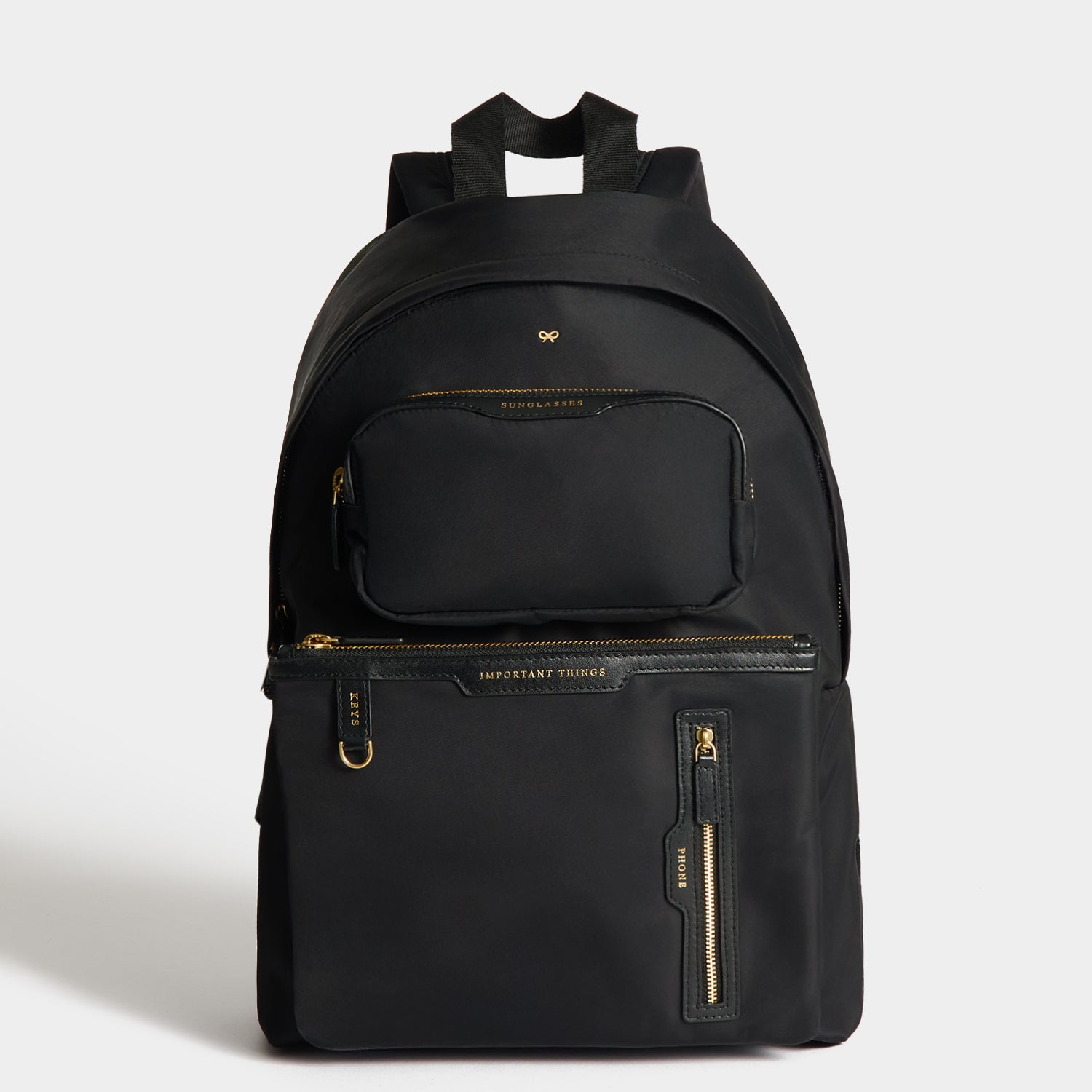 Multi Pocket Backpack -

          
            Regenerated ECONYL® in Black -
          

          Anya Hindmarch UK
