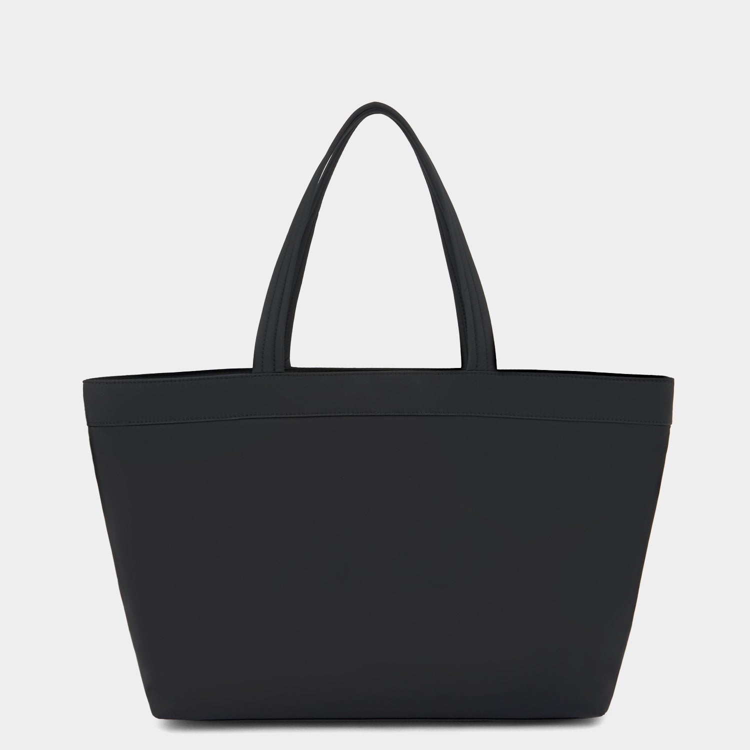 E/W Multi Pocket Tote -

                  
                    Regenerated ECONYL® in Black -
                  

                  Anya Hindmarch UK
