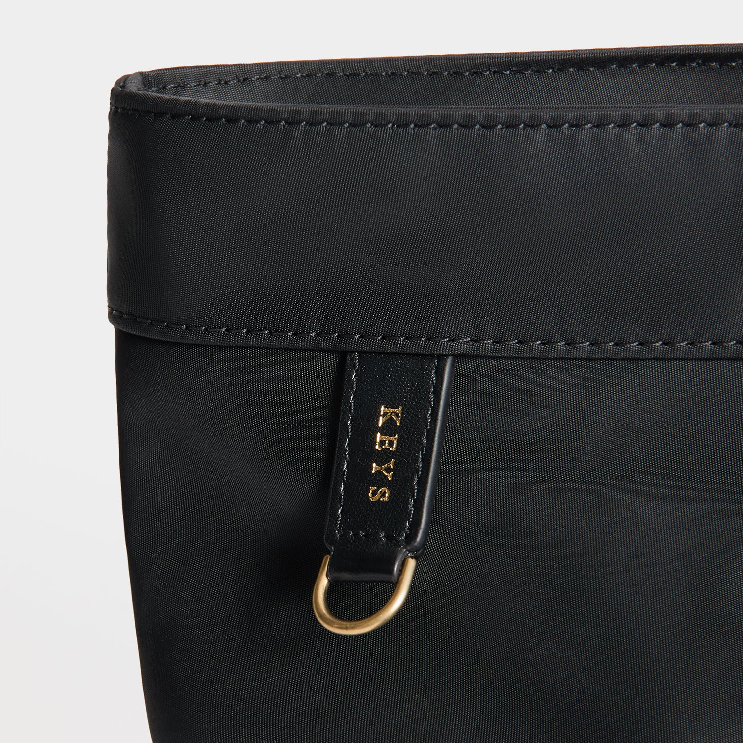 E/W Multi Pocket Tote -

          
            Regenerated ECONYL® in Black -
          

          Anya Hindmarch UK
