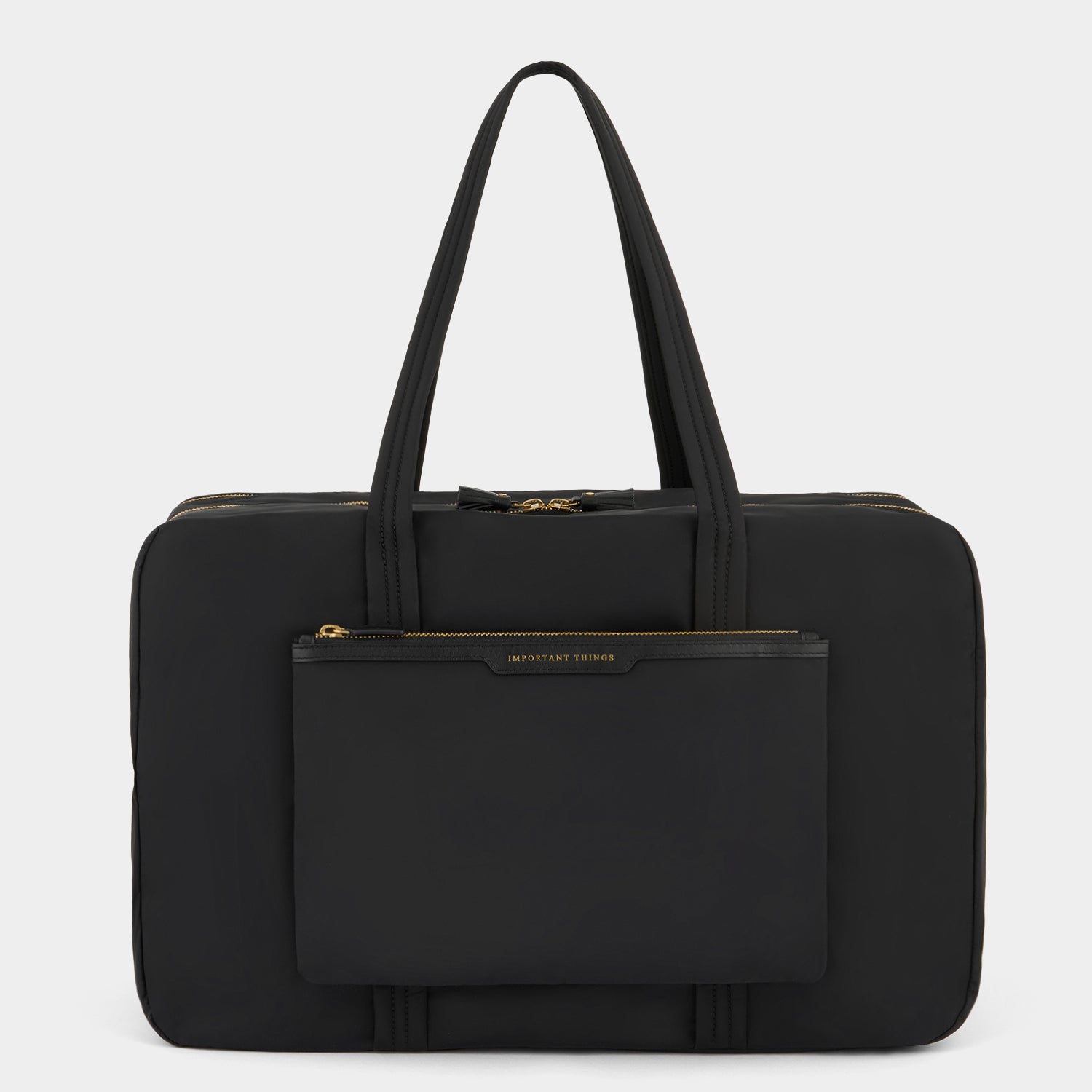 24 Hour Travel Bag -

          
            Regenerated ECONYL® in Black -
          

          Anya Hindmarch UK
