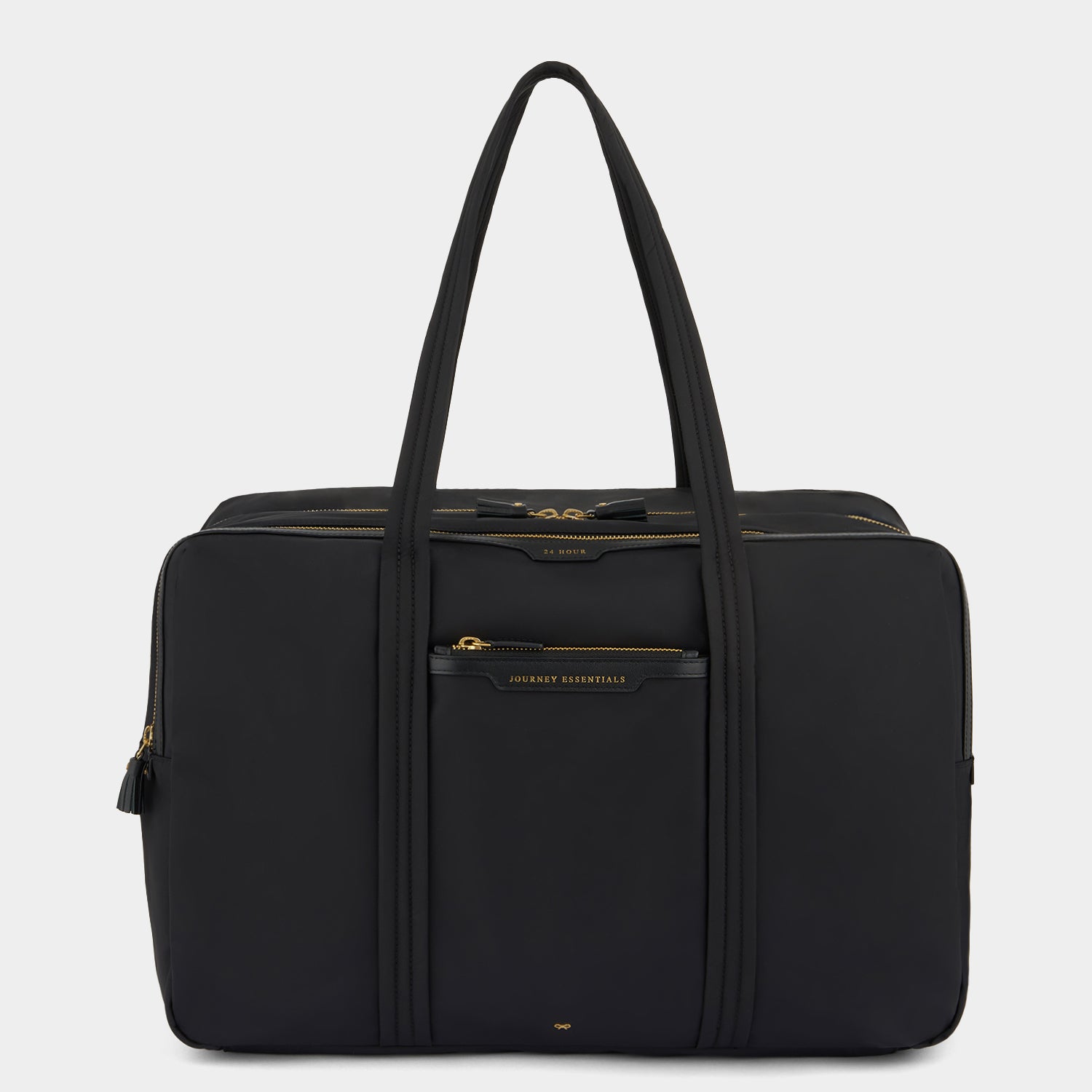 24 Hour Travel Bag -

          
            Regenerated ECONYL® in Black -
          

          Anya Hindmarch UK
