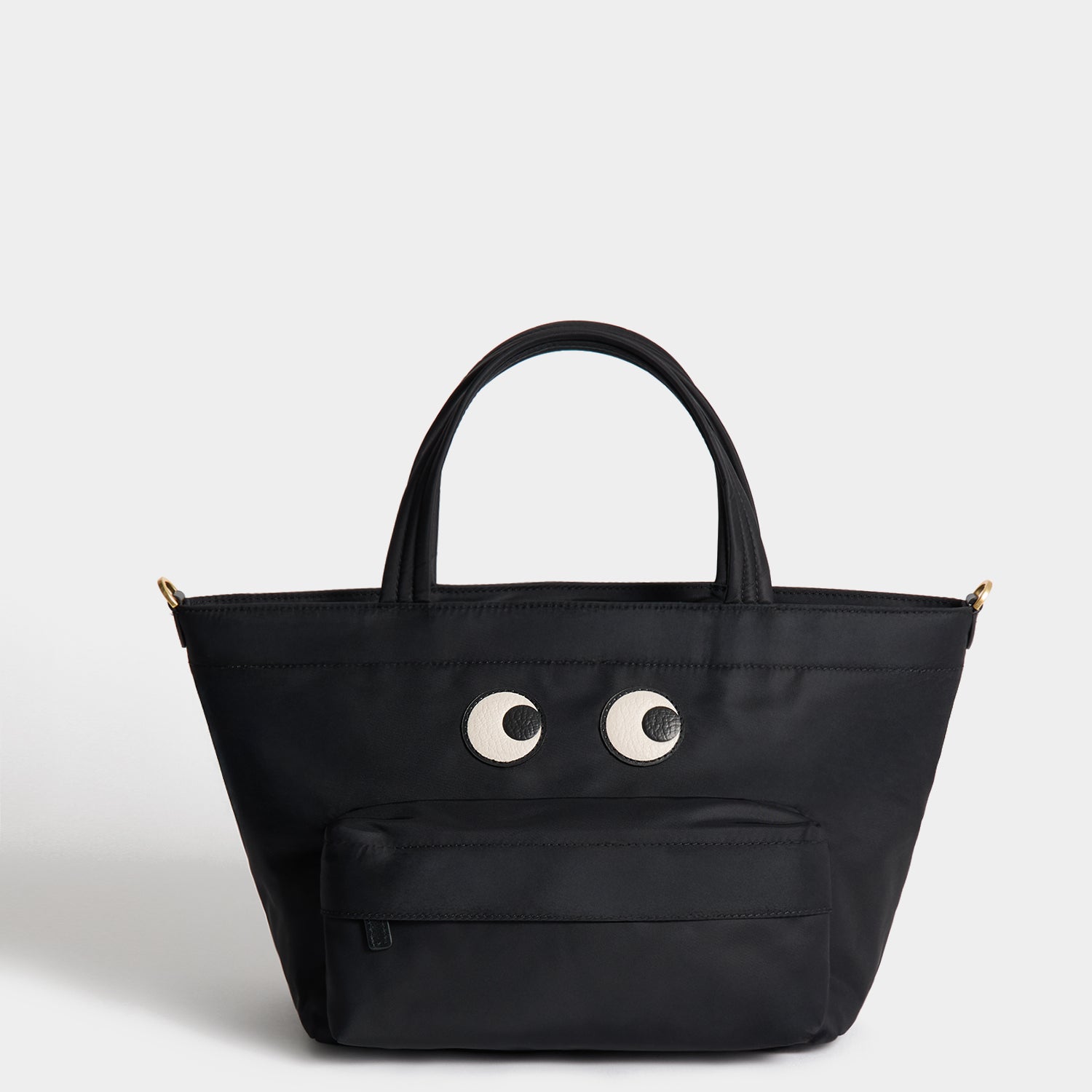 E/W Eyes Mini Cross-body Tote -

          
            Regenerated ECONYL® in Black -
          

          Anya Hindmarch UK
