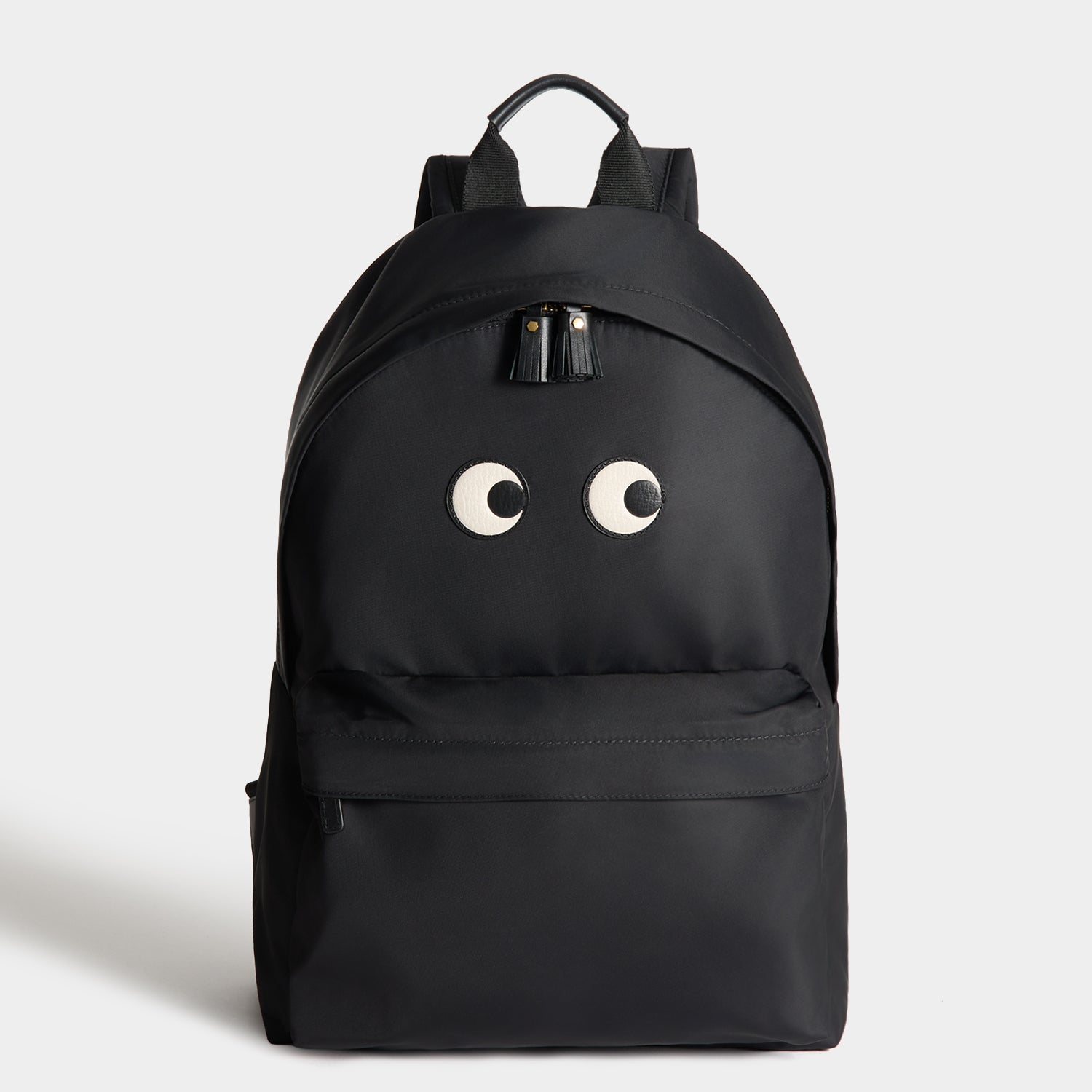 Eyes Backpack -

          
            Regenerated ECONYL® Nylon in Black -
          

          Anya Hindmarch UK

