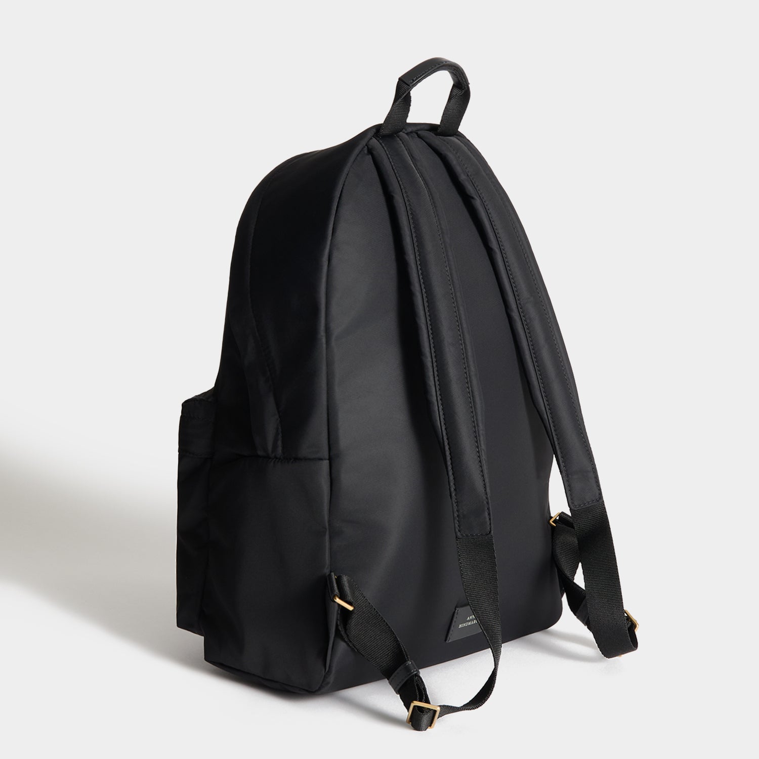 Eyes Backpack -

          
            Regenerated ECONYL® Nylon in Black -
          

          Anya Hindmarch UK
