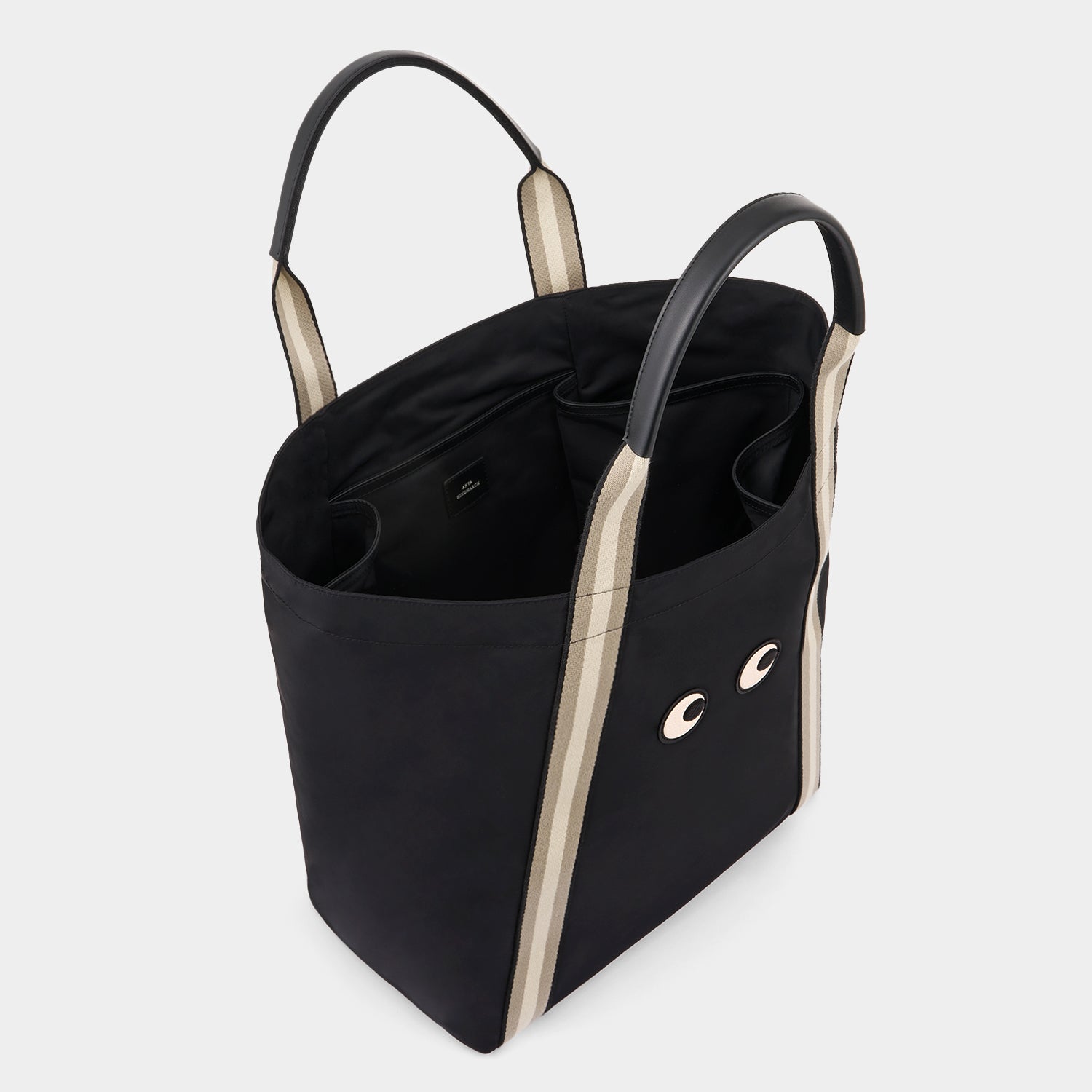 Eyes Shopping Tote -

                  
                    Regenerated ECONYL® in Black -
                  

                  Anya Hindmarch UK
