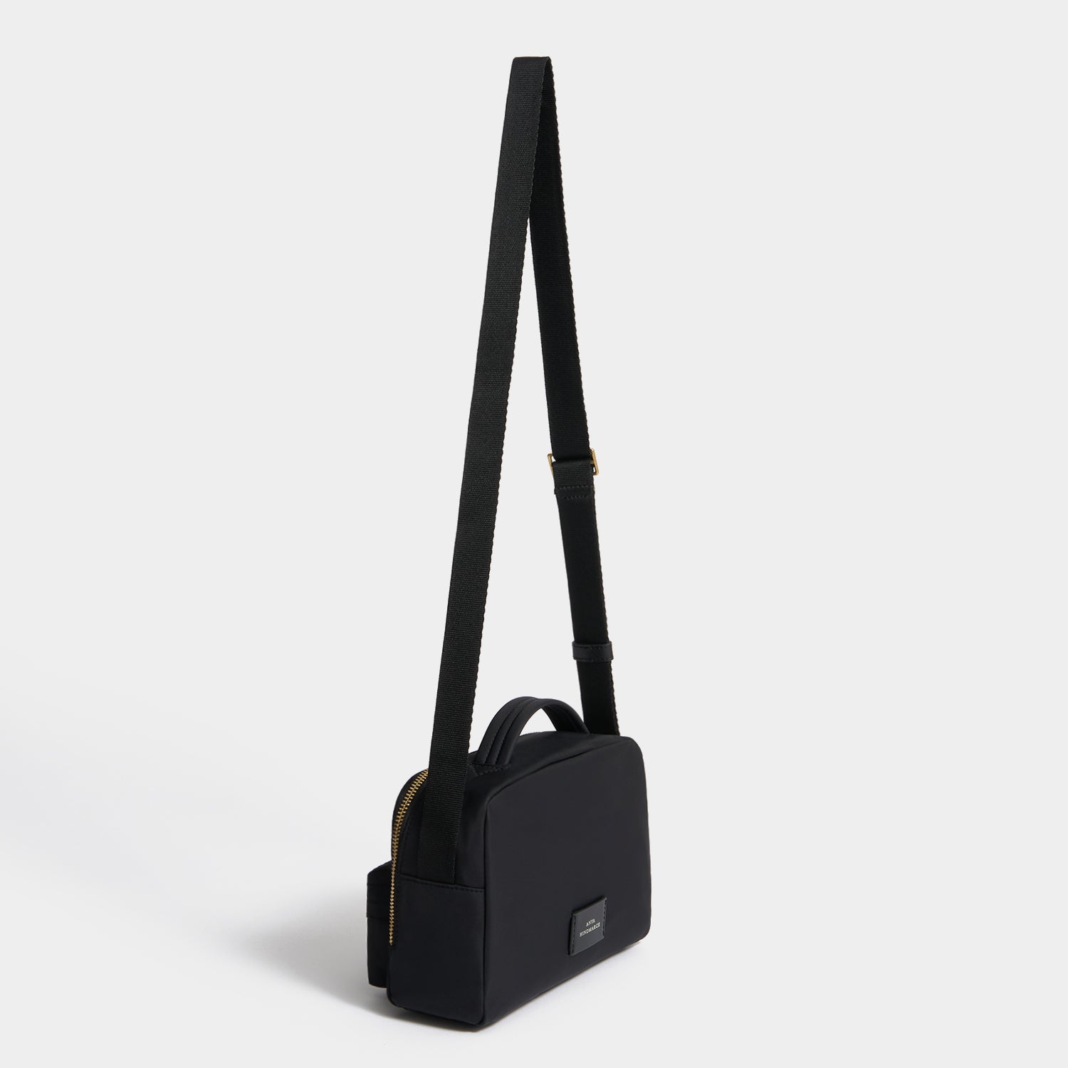 Eyes Cross-body -

          
            Regenerated ECONYL® in Black -
          

          Anya Hindmarch UK
