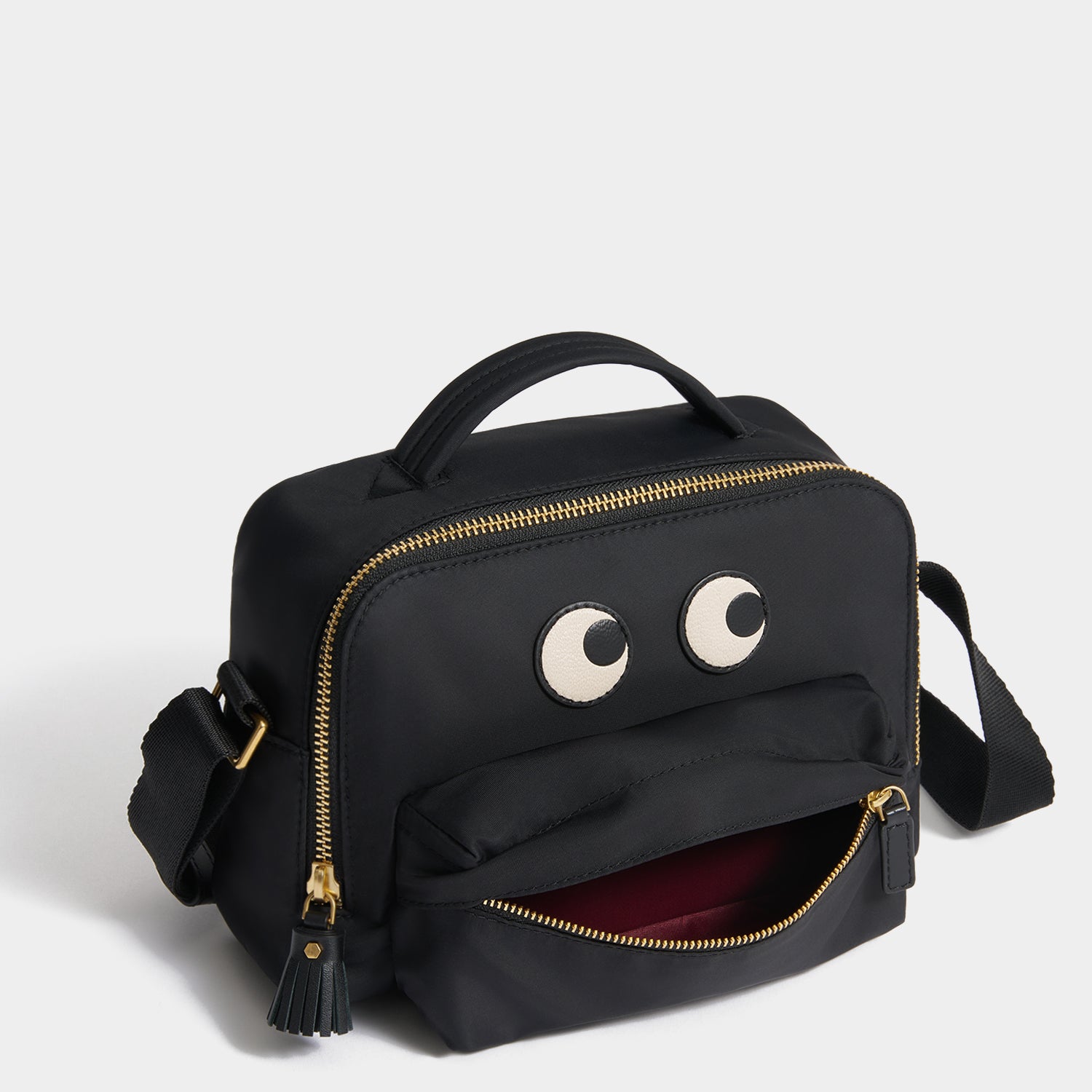 Eyes Cross-body -

          
            Regenerated ECONYL® in Black -
          

          Anya Hindmarch UK

