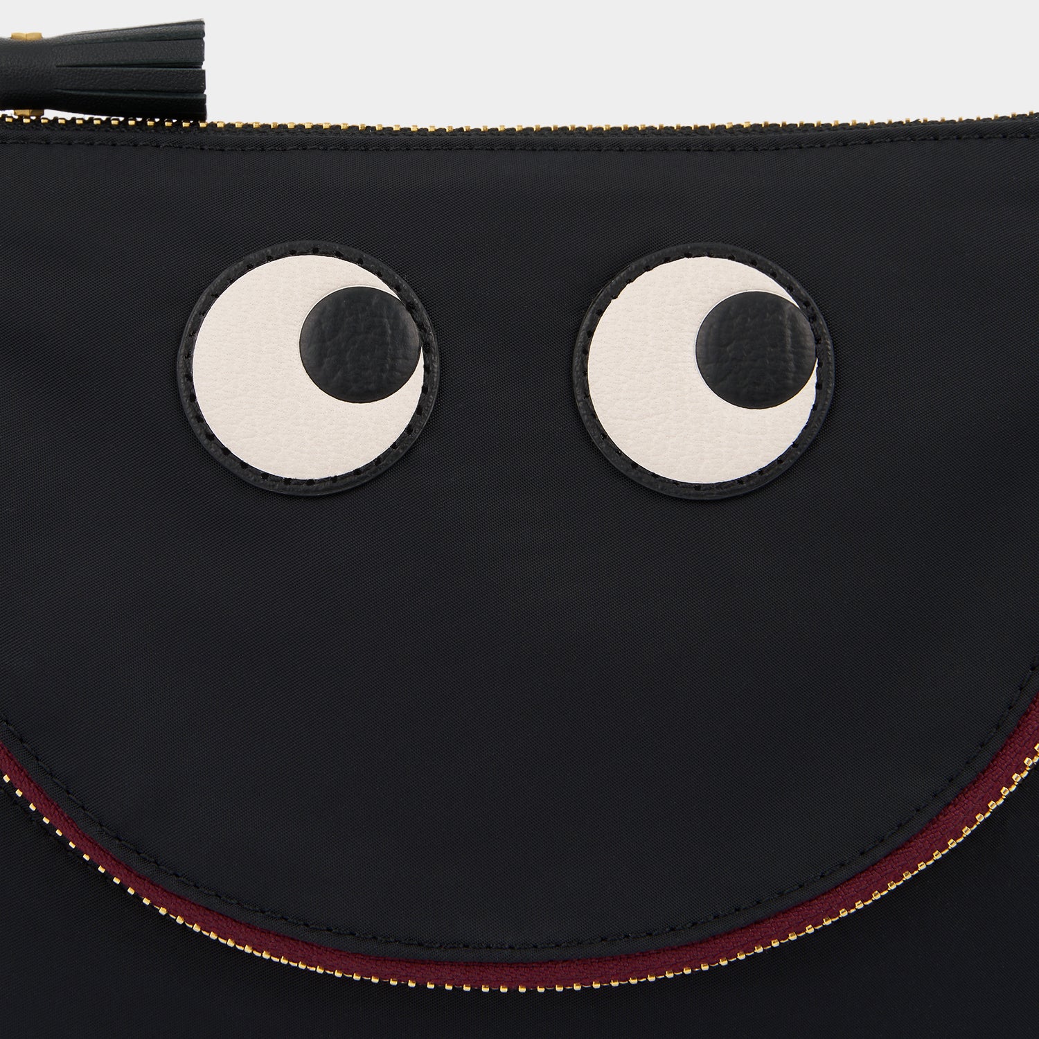 Eyes Pouch -

                  
                    Regenerated ECONYL® in Black -
                  

                  Anya Hindmarch UK
