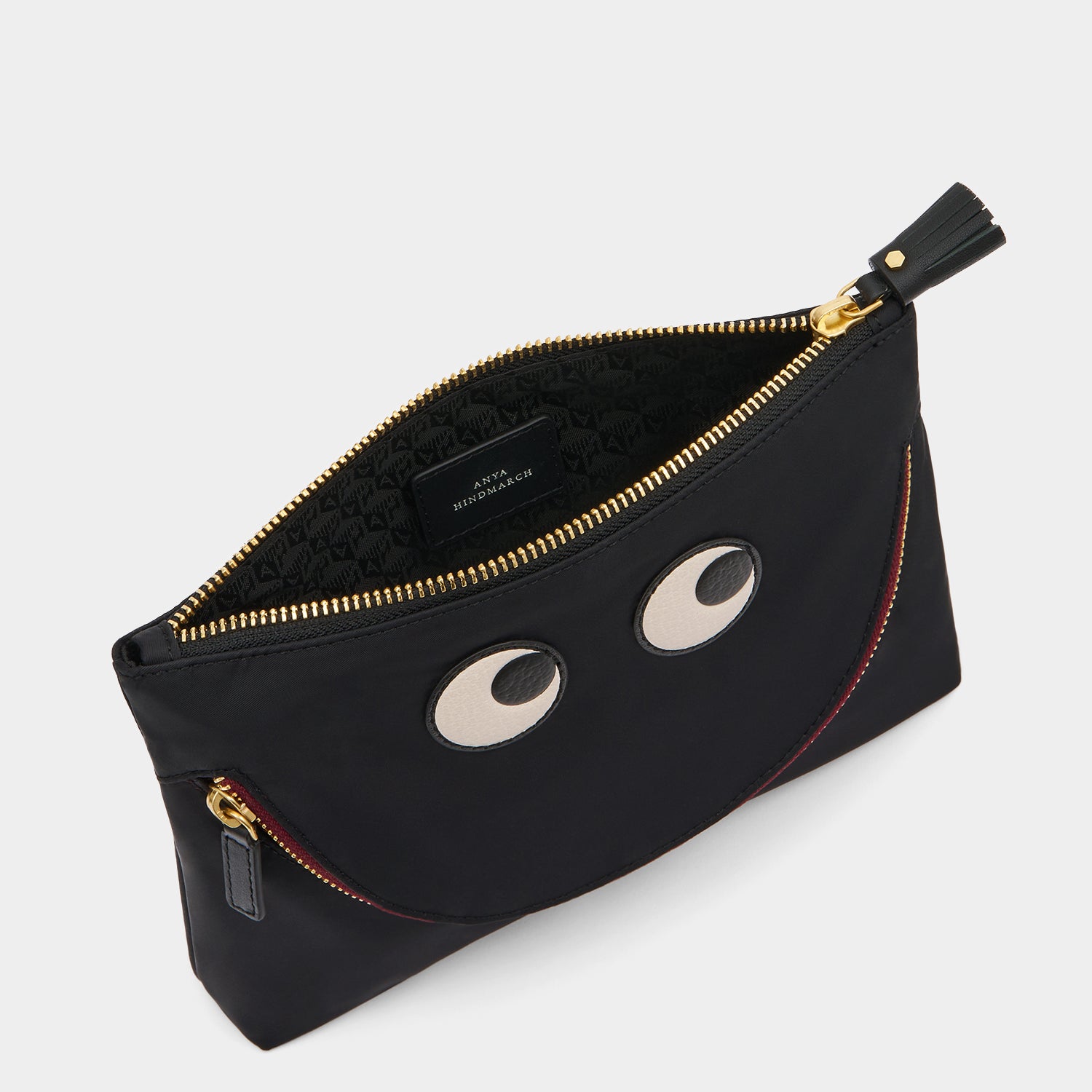 Eyes Pouch -

                  
                    Regenerated ECONYL® in Black -
                  

                  Anya Hindmarch UK
