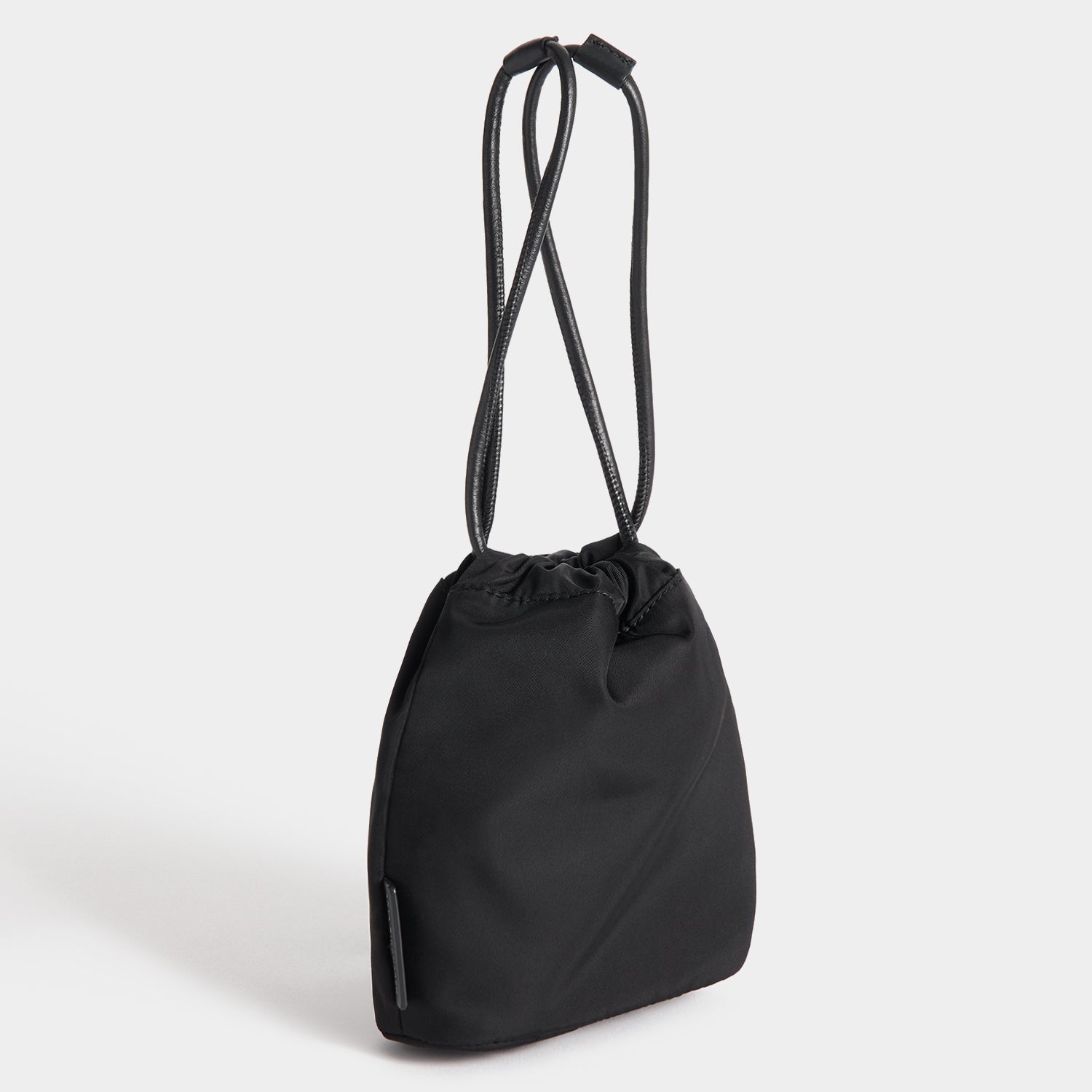 Eyes Drawstring Pouch -

          
            Regenerated ECONYL® in Black -
          

          Anya Hindmarch UK
