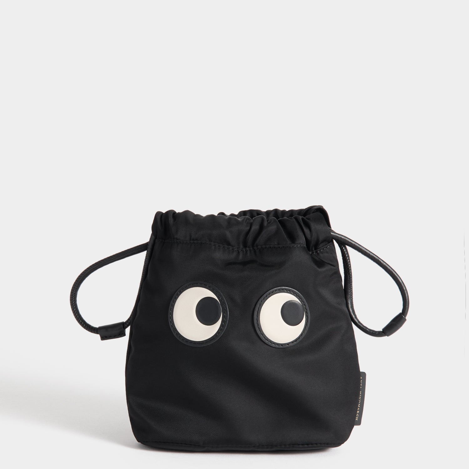 Eyes Drawstring Pouch -

          
            Regenerated ECONYL® in Black -
          

          Anya Hindmarch UK
