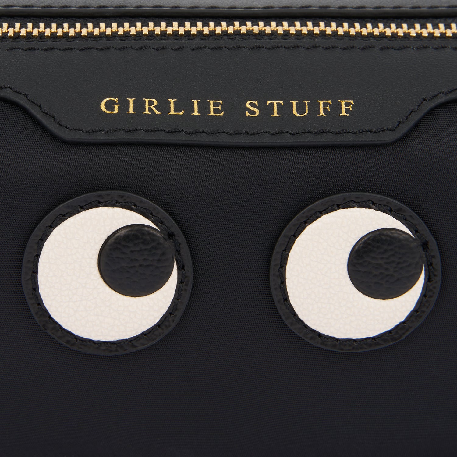 Eyes Girlie Stuff Pouch -

                  
                    Regenerated ECONYL® in Black -
                  

                  Anya Hindmarch UK
