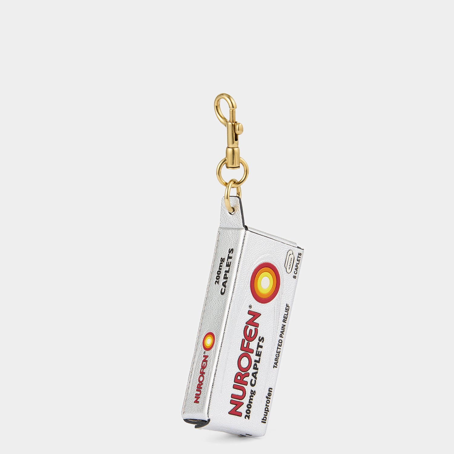 Anya Brands Nurofen Charm -

                  
                    Capra Leather in Metallic Silver -
                  

                  Anya Hindmarch UK
