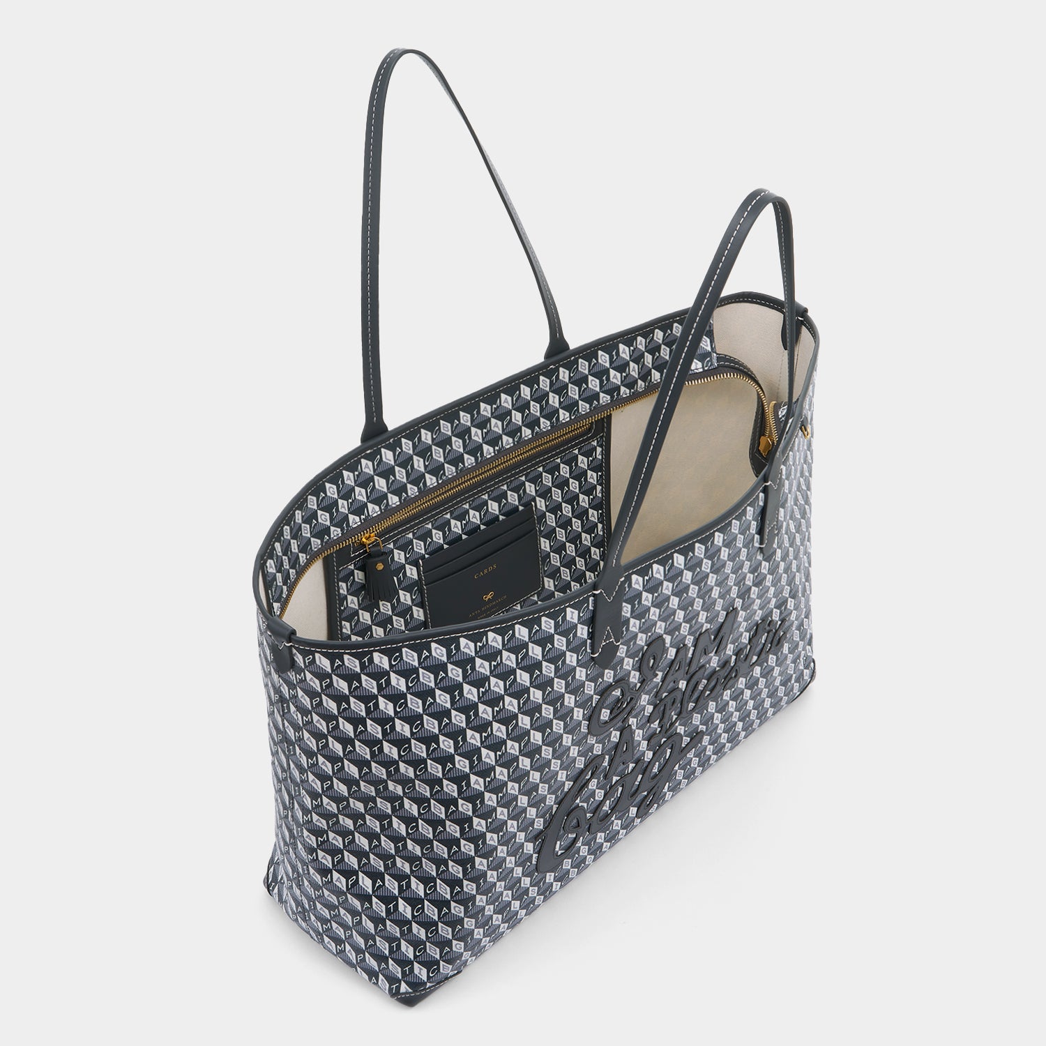 I Am A Plastic Bag Zipped Motif Tote -

                  
                    Recycled Canvas in Charcoal -
                  

                  Anya Hindmarch UK
