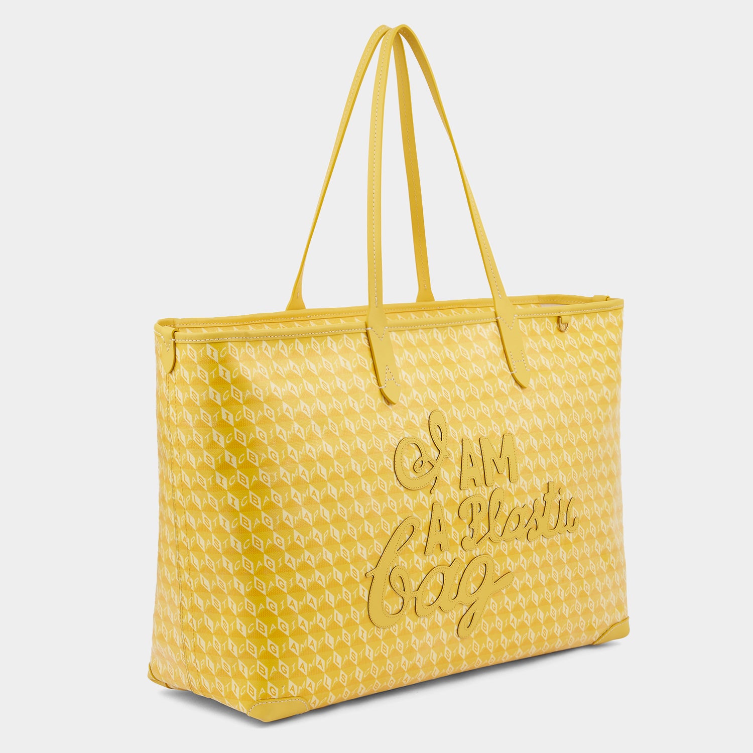 I Am A Plastic Bag Zipped Motif Tote -

                  
                    Recycled Canvas in Lemon Curd -
                  

                  Anya Hindmarch UK
