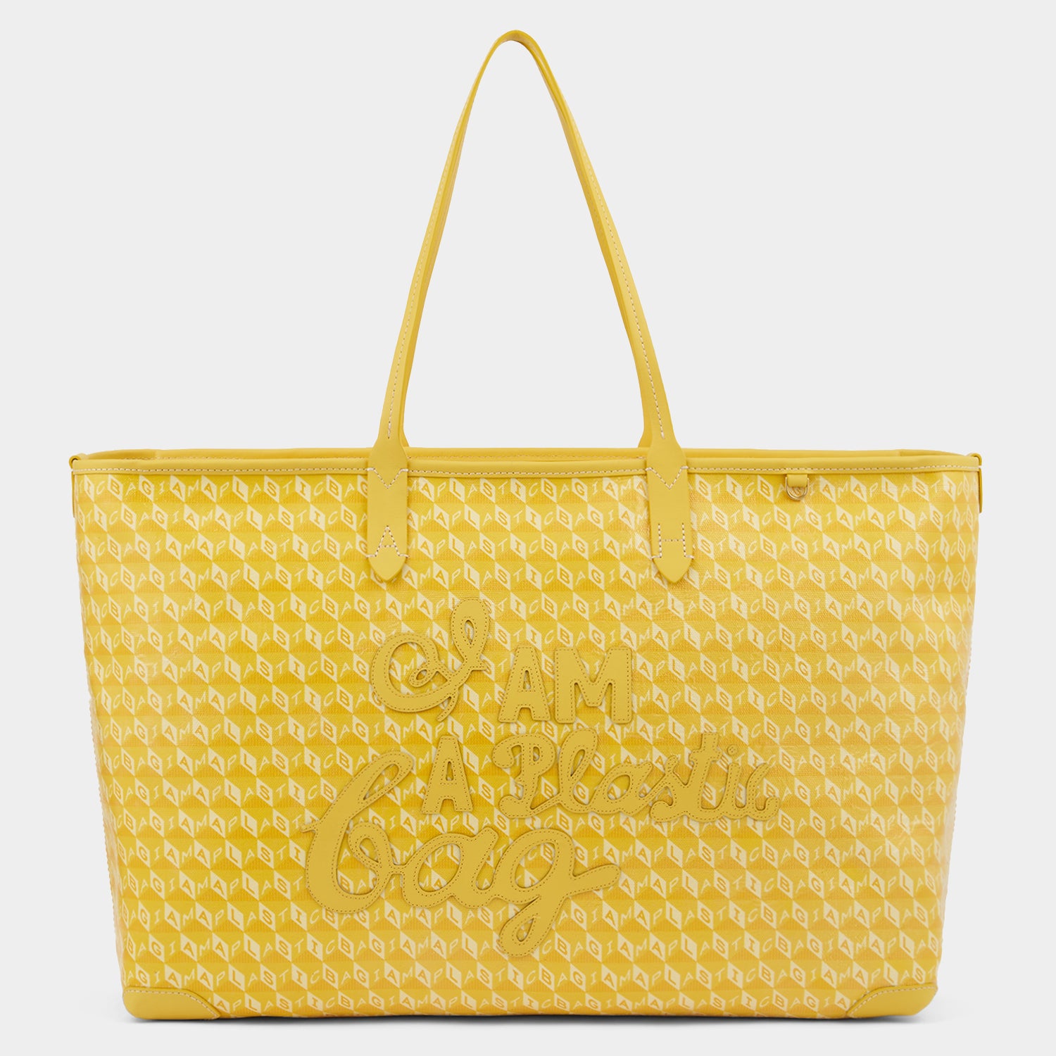 I Am A Plastic Bag Zipped Motif Tote -

                  
                    Recycled Canvas in Lemon Curd -
                  

                  Anya Hindmarch UK
