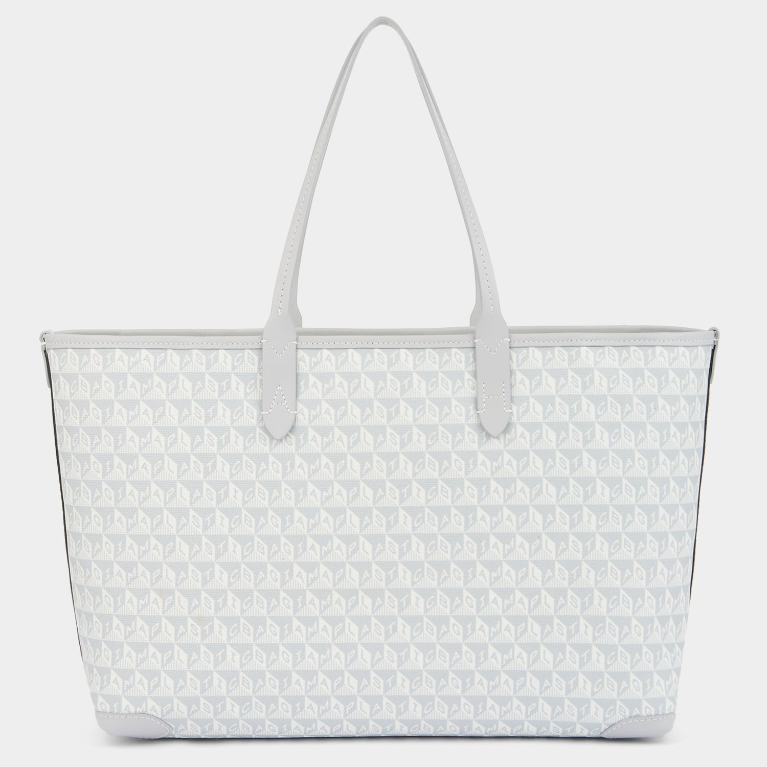 I Am A Plastic Bag Wink Zipped Tote -

                  
                    Recycled Canvas in Frost -
                  

                  Anya Hindmarch UK
