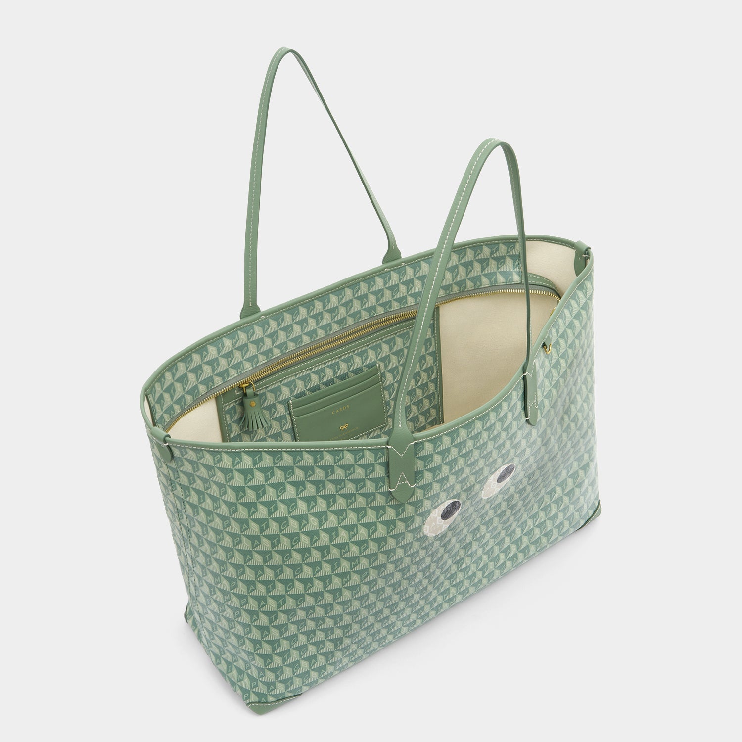 I Am A Plastic Bag Eyes Zipped Tote -

                  
                    Recycled Canvas in Moss -
                  

                  Anya Hindmarch UK
