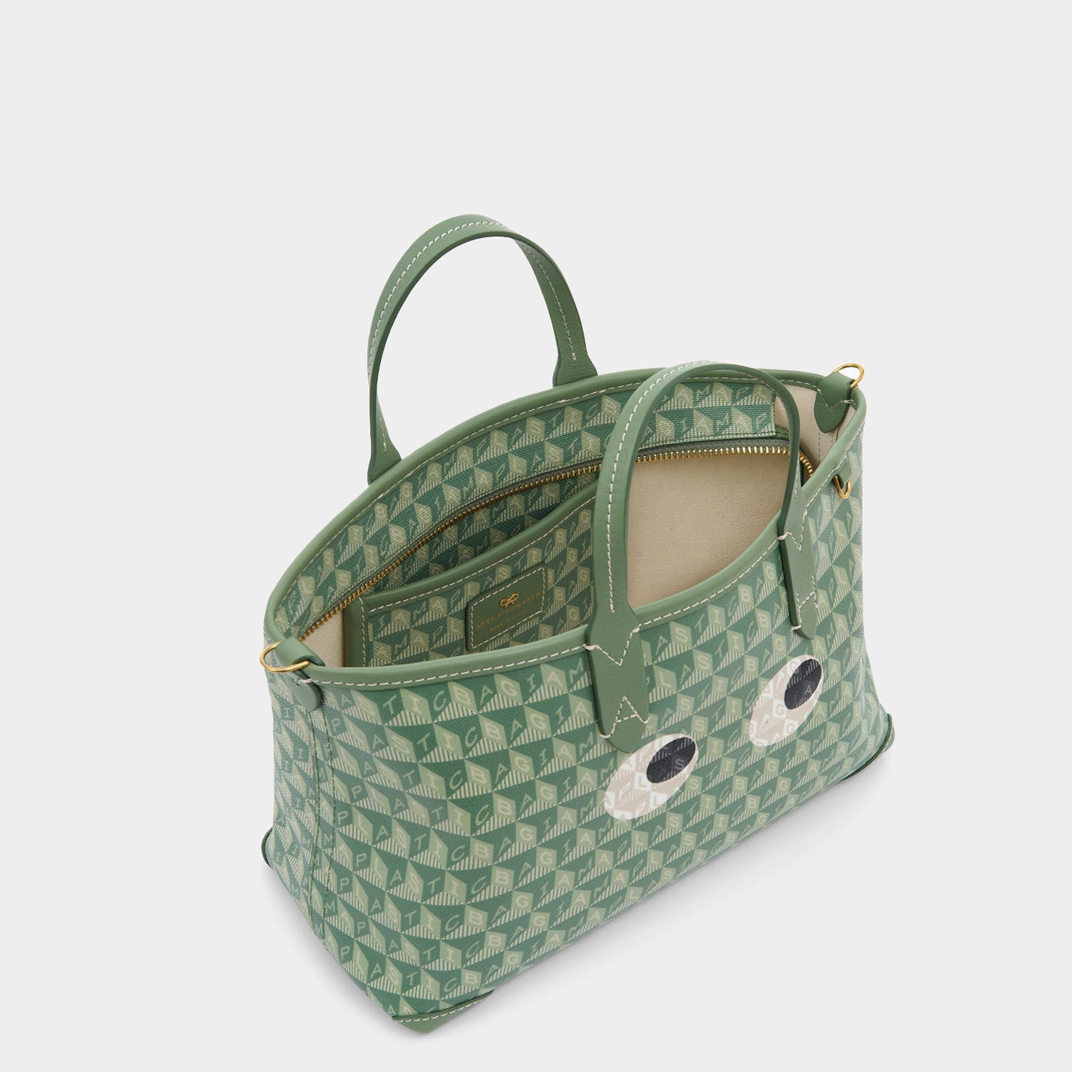 I Am A Plastic Bag XS Eyes Zipped Cross-body Tote -

                  
                    Recycled Canvas in Moss -
                  

                  Anya Hindmarch UK
