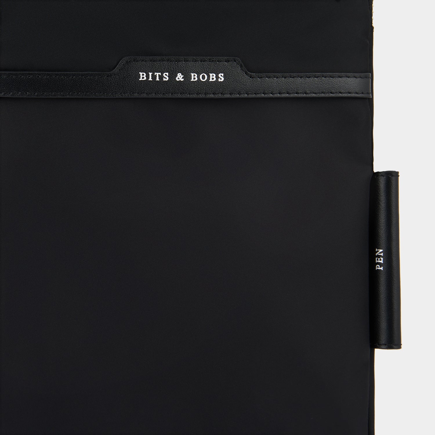 Technology Case -

                  
                    Regenerated ECONYL® in Black -
                  

                  Anya Hindmarch UK
