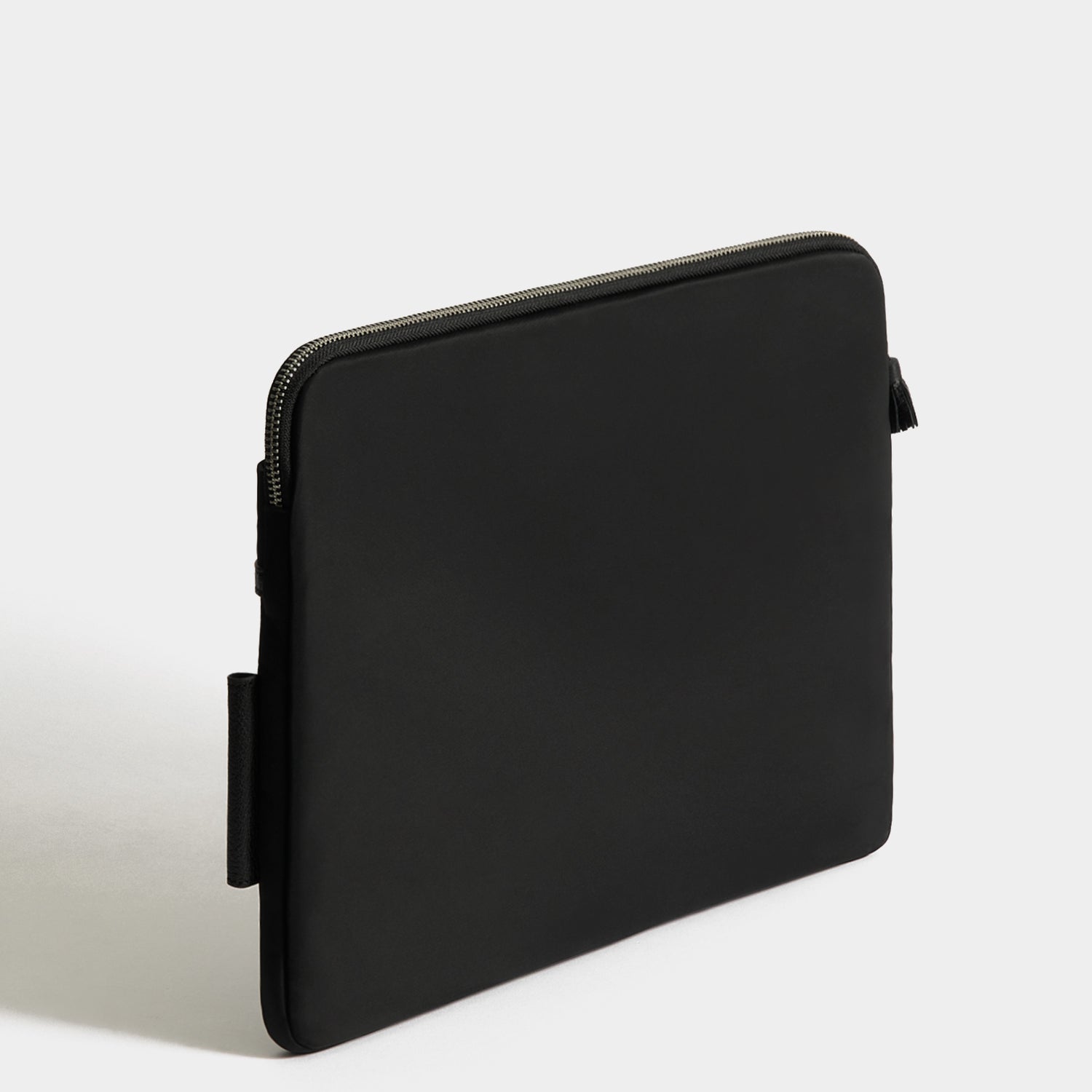 Technology Case -

          
            Regenerated ECONYL® in Black -
          

          Anya Hindmarch UK

