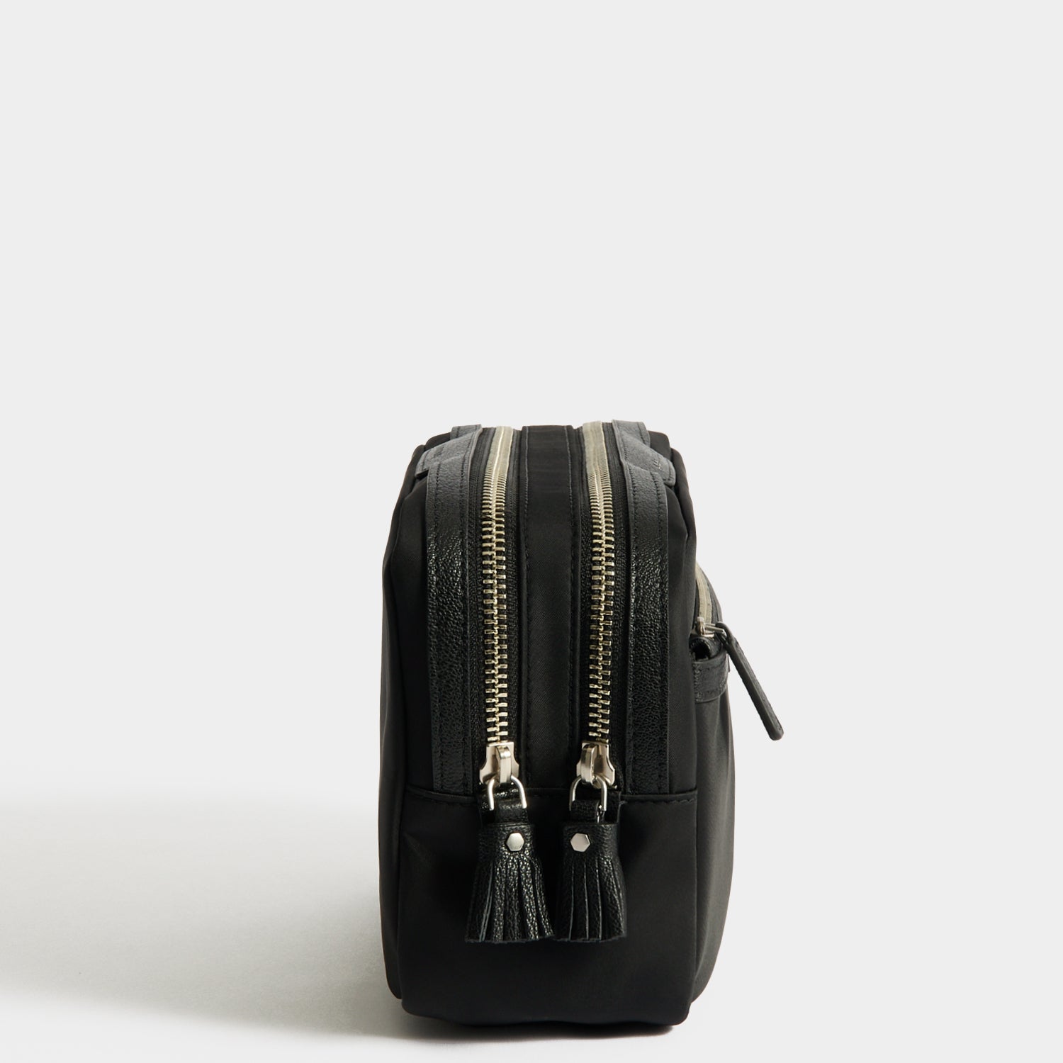 Travel Kit Pouch -

          
            Regenerated ECONYL® in Black -
          

          Anya Hindmarch UK
