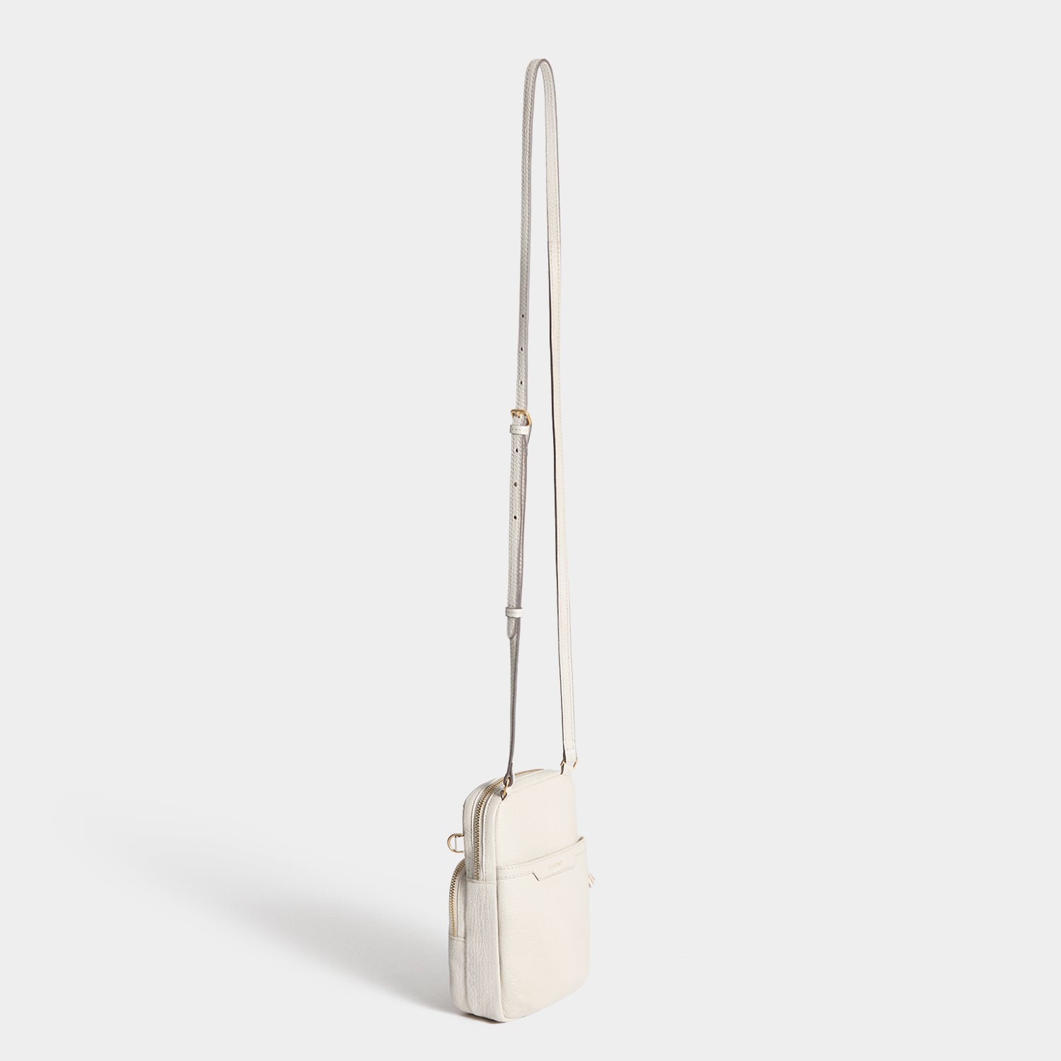 All Over Stickers Essential Cross-body -

          
            Capra Leather in Chalk -
          

          Anya Hindmarch UK
