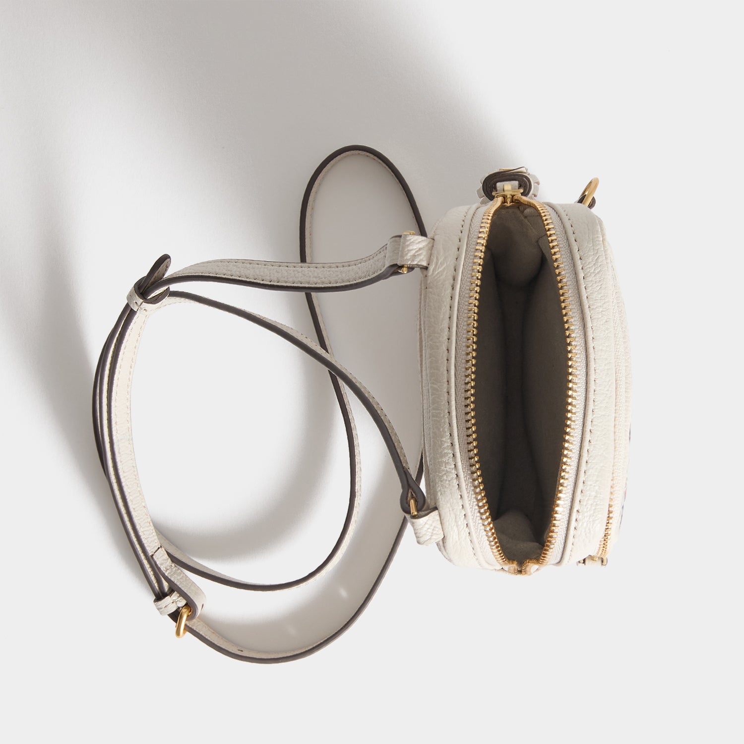 All Over Stickers Essential Cross-body -

          
            Capra Leather in Chalk -
          

          Anya Hindmarch UK
