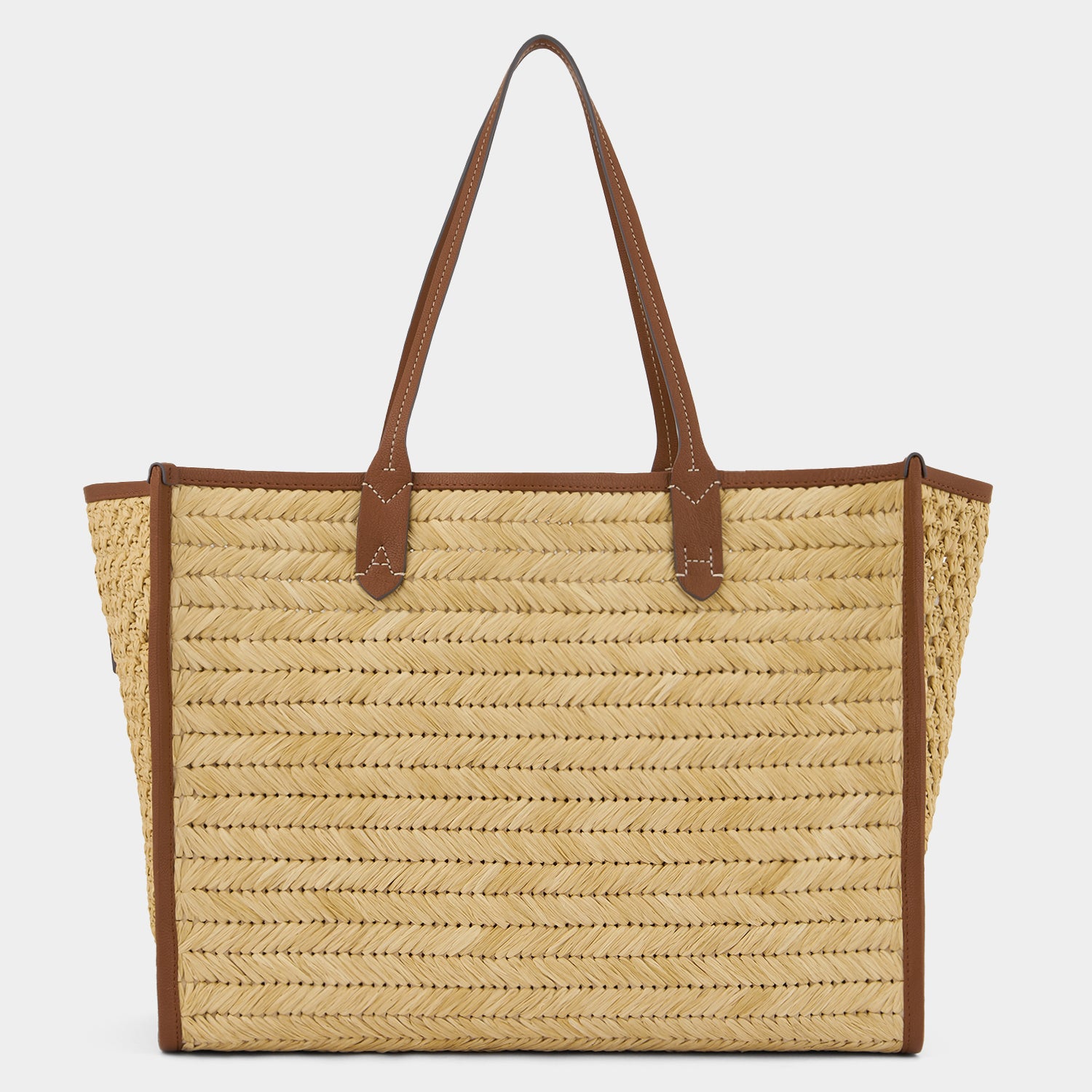 Raffia Pocket Tote -

                  
                    Raffia in Cedar -
                  

                  Anya Hindmarch UK
