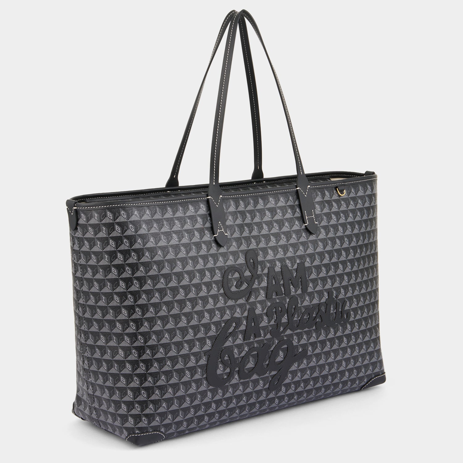 I Am A Plastic Bag Zipped Motif Tote -

                  
                    Recycled Canvas in Black -
                  

                  Anya Hindmarch UK
