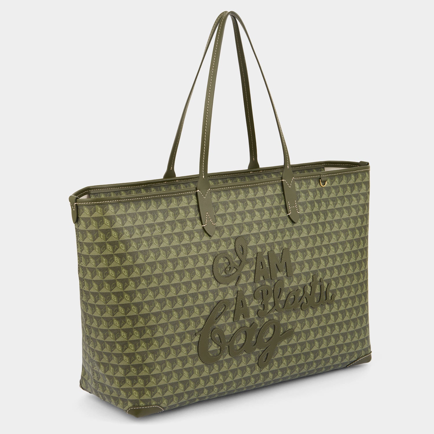 I Am A Plastic Bag Zipped Motif Tote -

                  
                    Recycled Canvas in Fern -
                  

                  Anya Hindmarch UK
