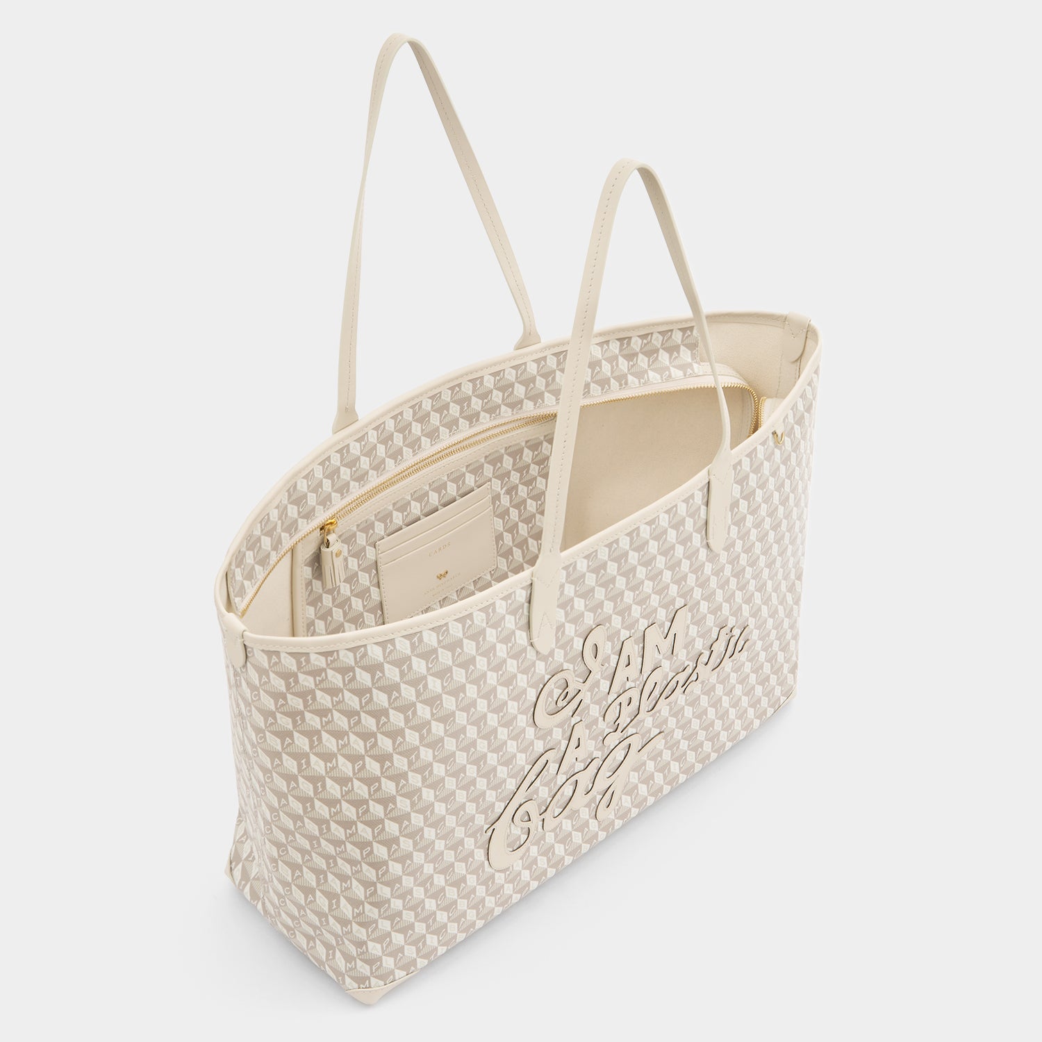 I Am A Plastic Bag Zipped Motif Tote -

                  
                    Recycled Canvas in Chalk -
                  

                  Anya Hindmarch UK
