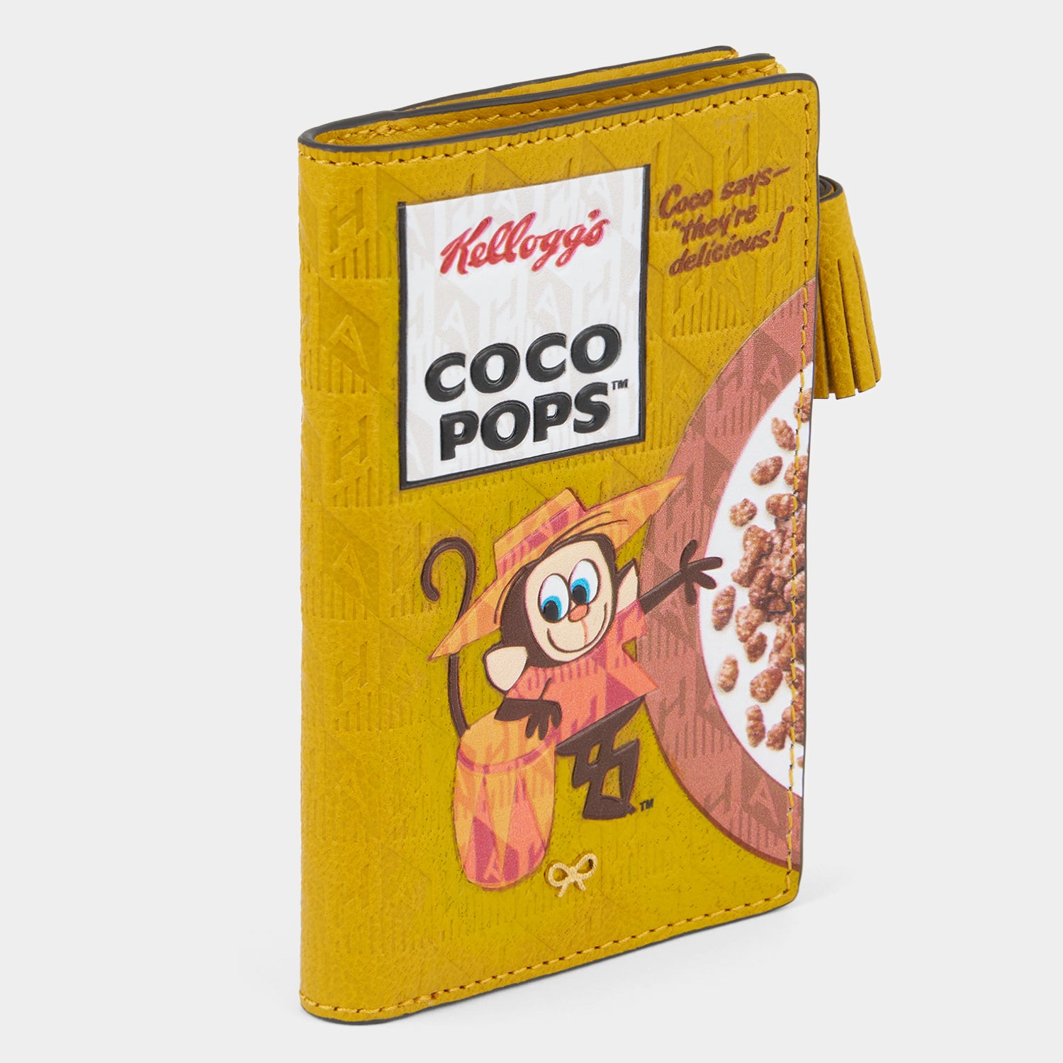 Anya Brands Coco Pops Folding Wallet -

                  
                    Capra Leather in Mustard -
                  

                  Anya Hindmarch UK
