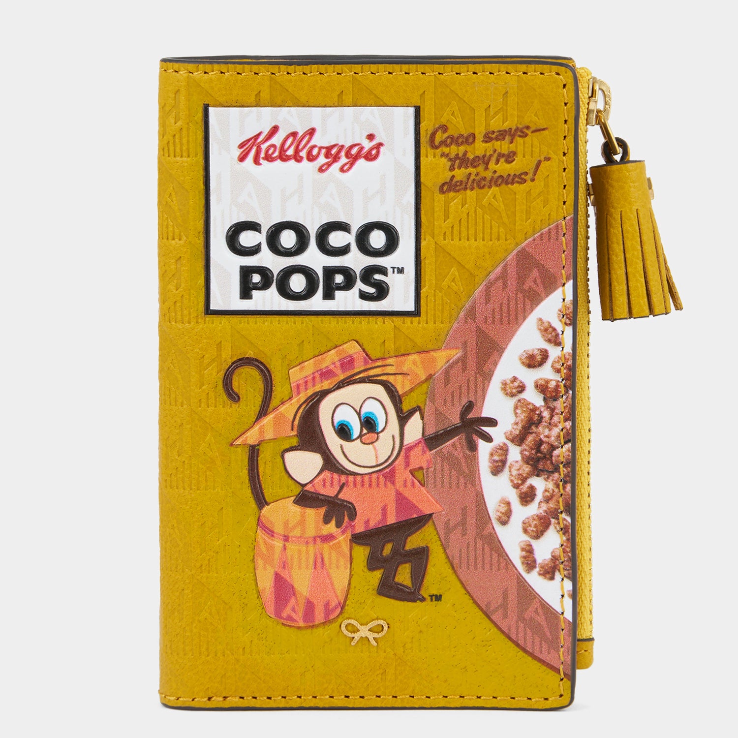 Anya Brands Coco Pops Folding Wallet -

                  
                    Capra Leather in Mustard -
                  

                  Anya Hindmarch UK
