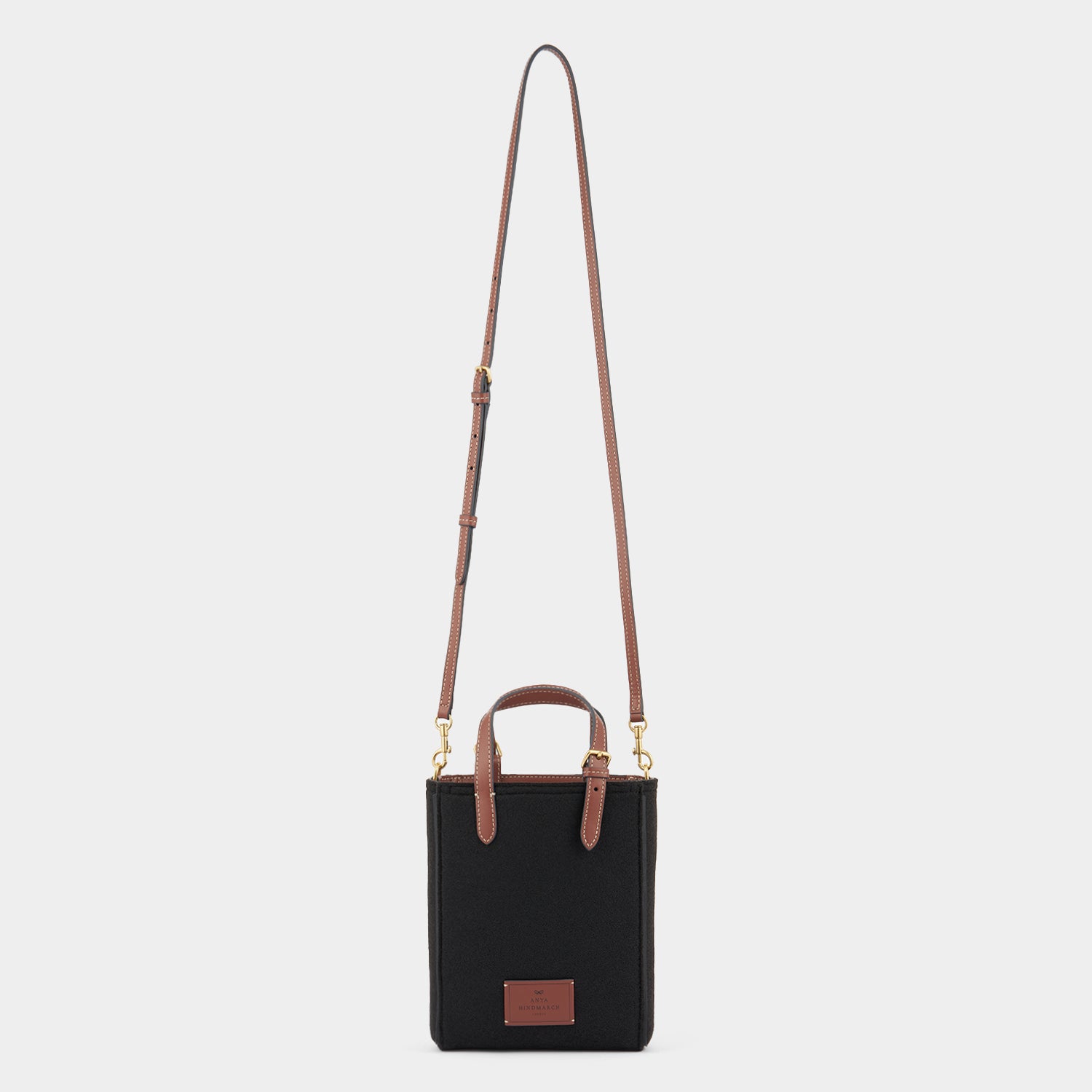 Mini N/S Eyes Felt Cross-body Tote -

          
            Wool Felt in Black -
          

          Anya Hindmarch UK
