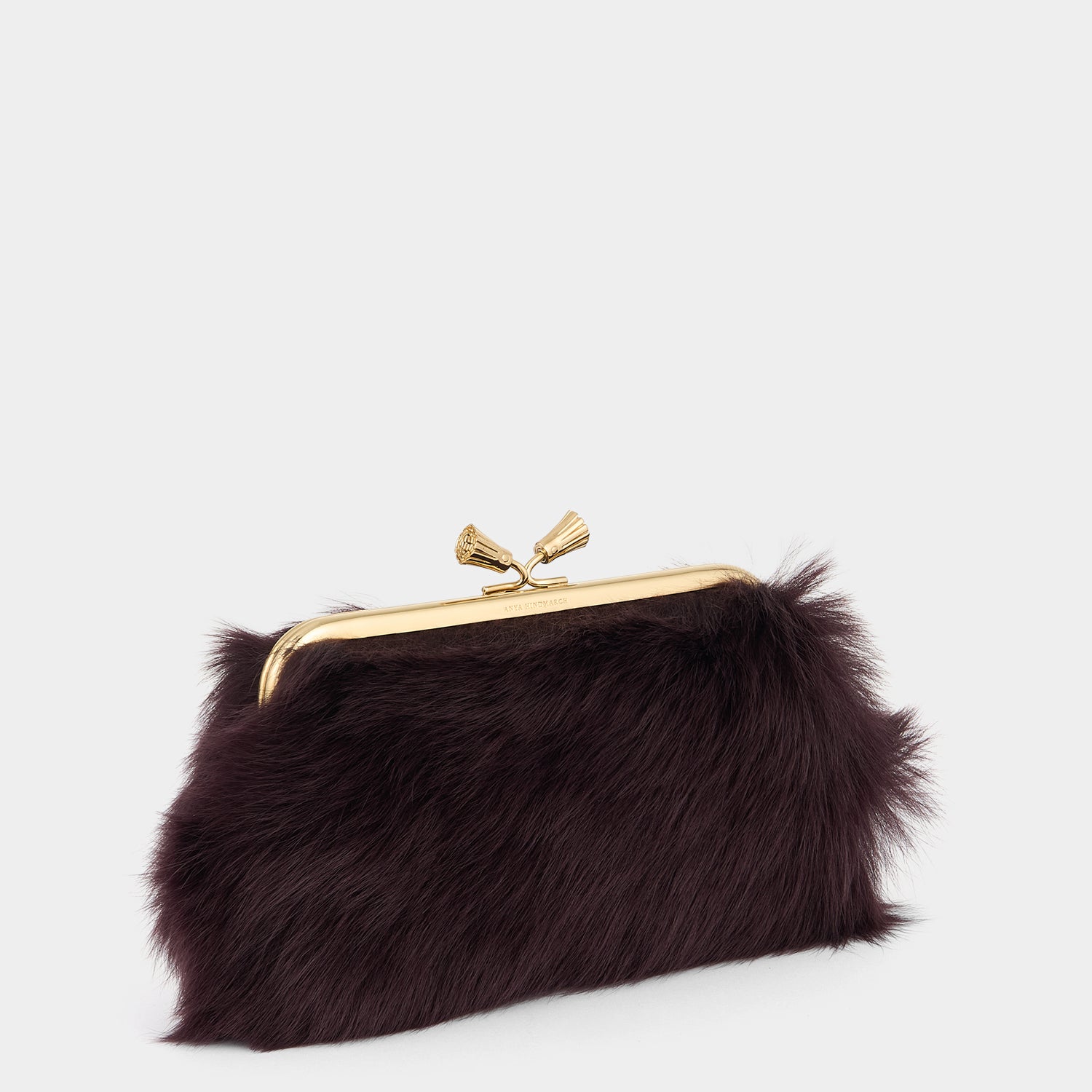 Maud Shearling Tassel Clutch -

          
            Shearling in Burgundy -
          

          Anya Hindmarch UK

